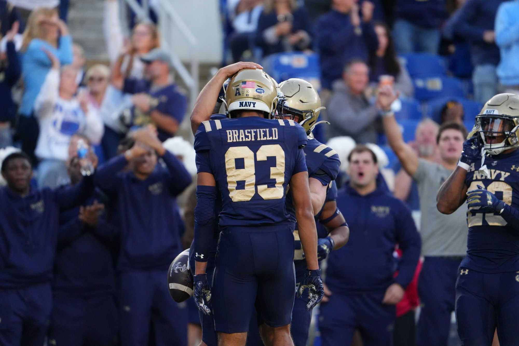 Truman Brasfield celebrates a Navy touchdown