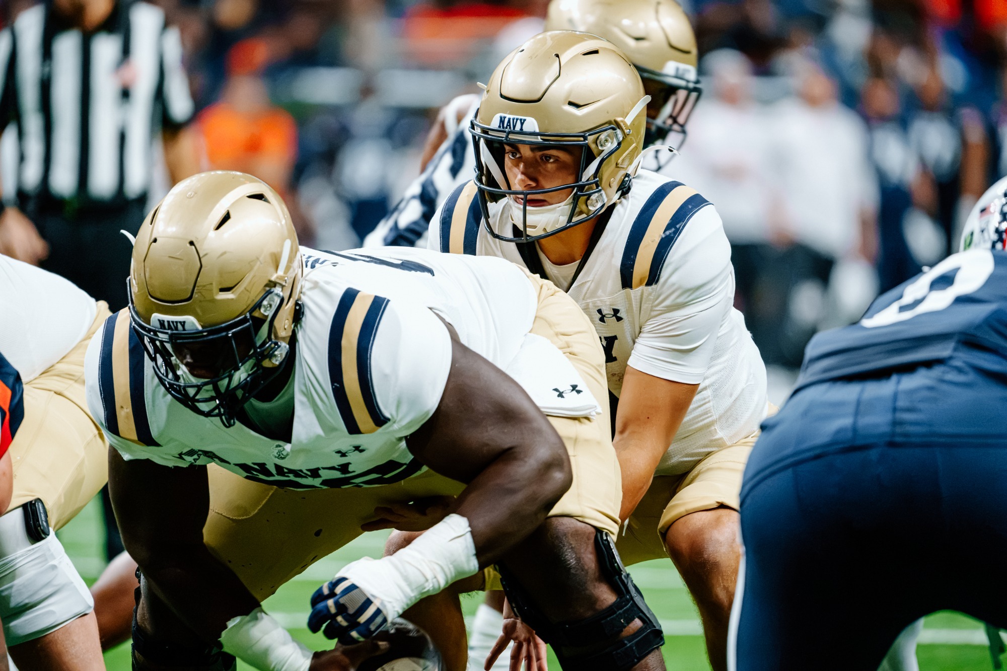 Jackson Gutierrez takes a snap from Cam Nichols