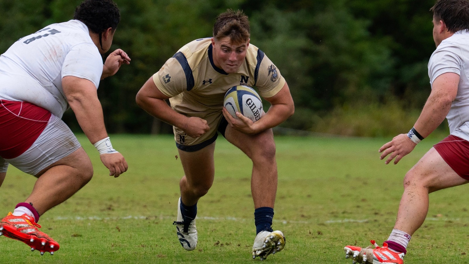 Waylon Davis running between Southern Virginia defenders