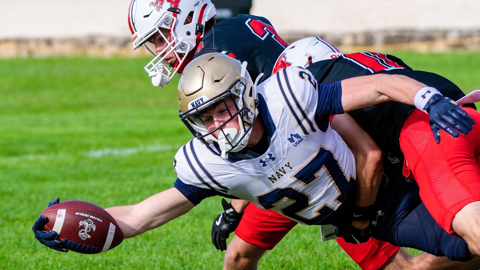 Jon Malatesta diving into the end zone at Chestnut Hill