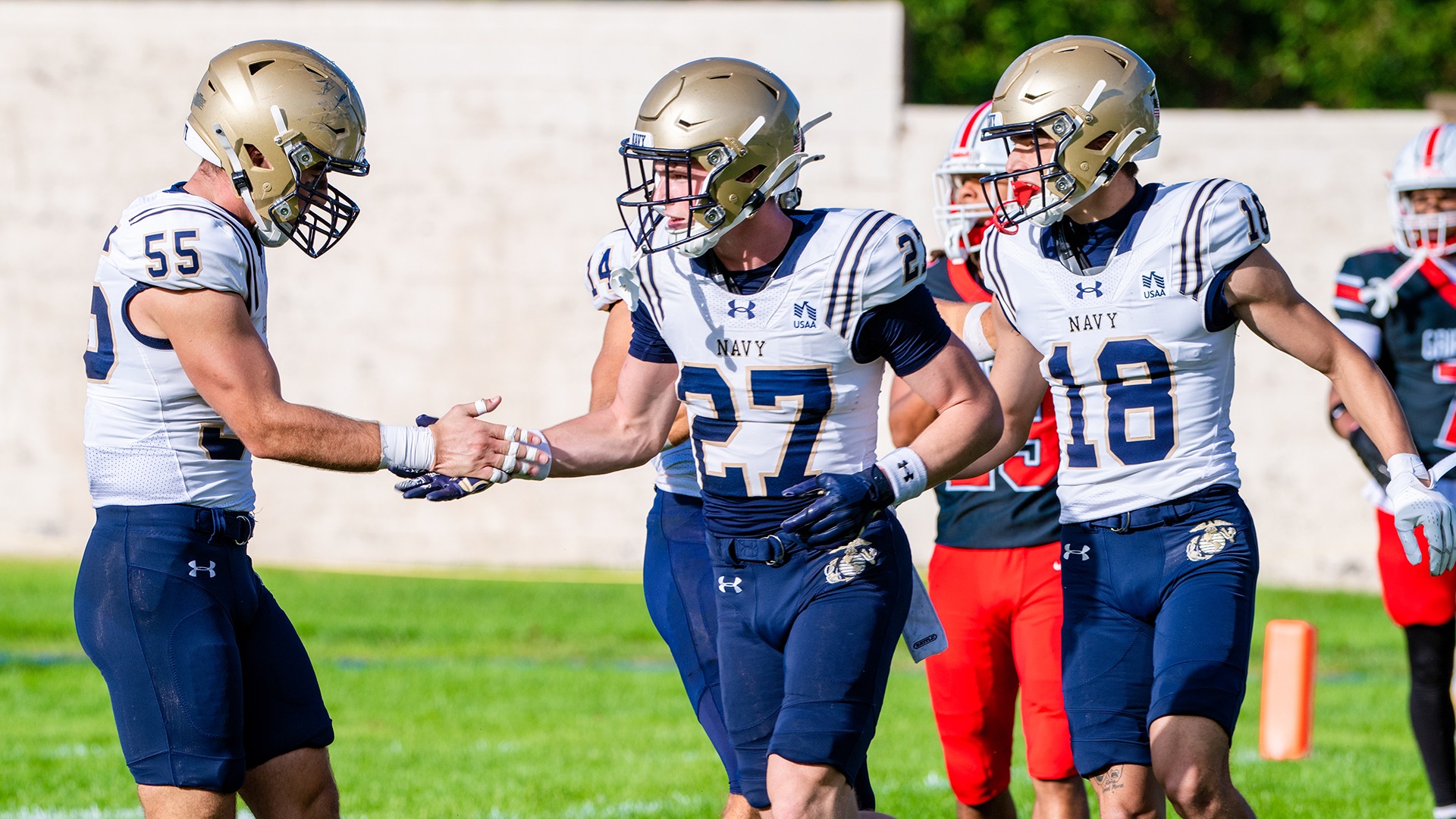 Jon Malatesta celebration with teammates at Chestnut Hill