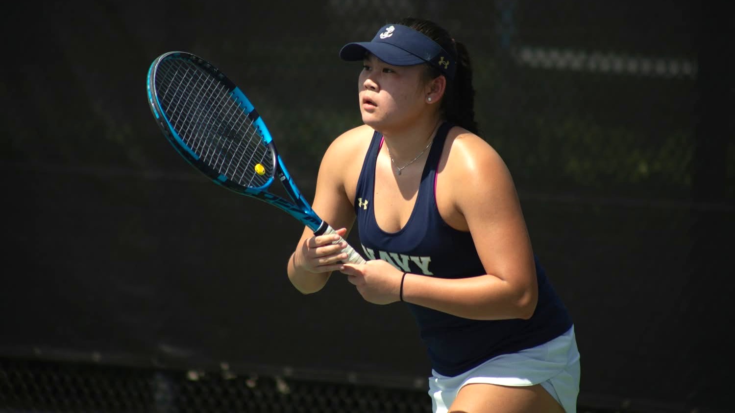 Navy women's tennis sophomore Grace Li prepares to receive a serve against Fairfield on March 9, 2026
