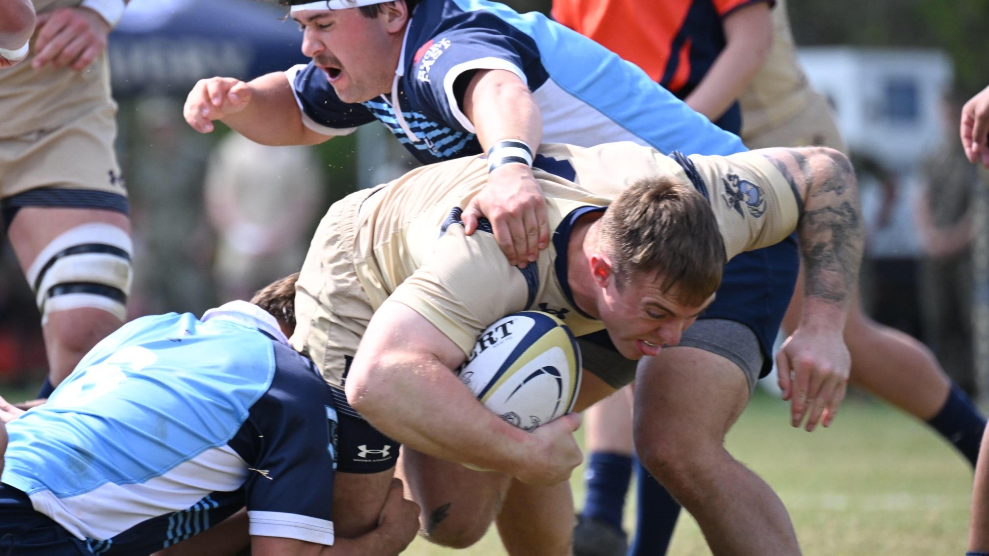 Aidan Bryan running in the playoff game against Mary Washington on 4.11.26