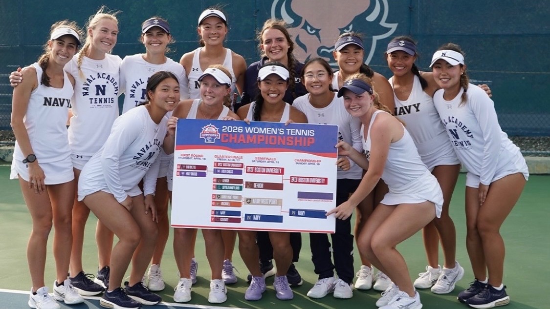 The Navy women's tennis team after defeating rival Army in the 2026 Patriot League semifinal round on April 18, 2026 in Lewisburg, Pa.
