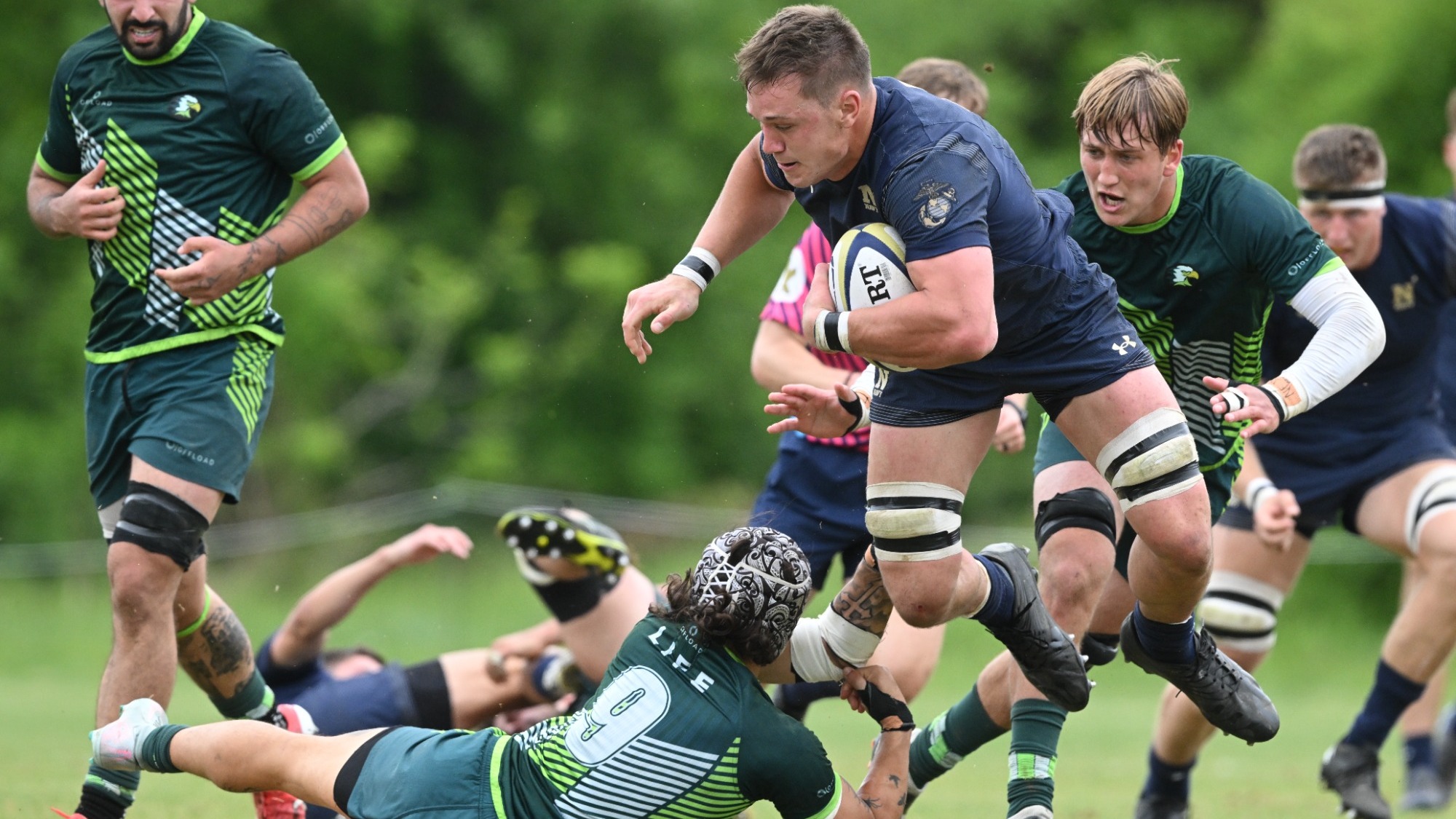 Austin Taylor jumping over Life defender in the semifinal game on 4.25.26