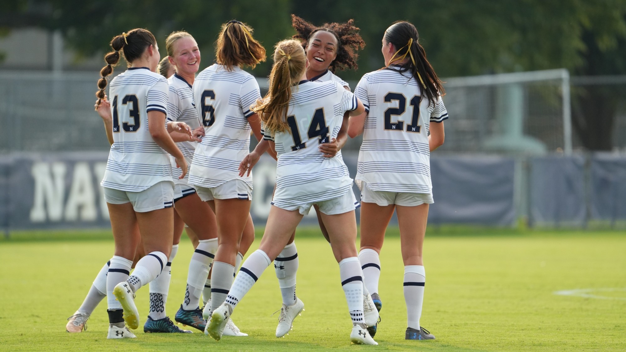 Kayana Adlam celebrating her goal with teammates on Aug. 12, 2026