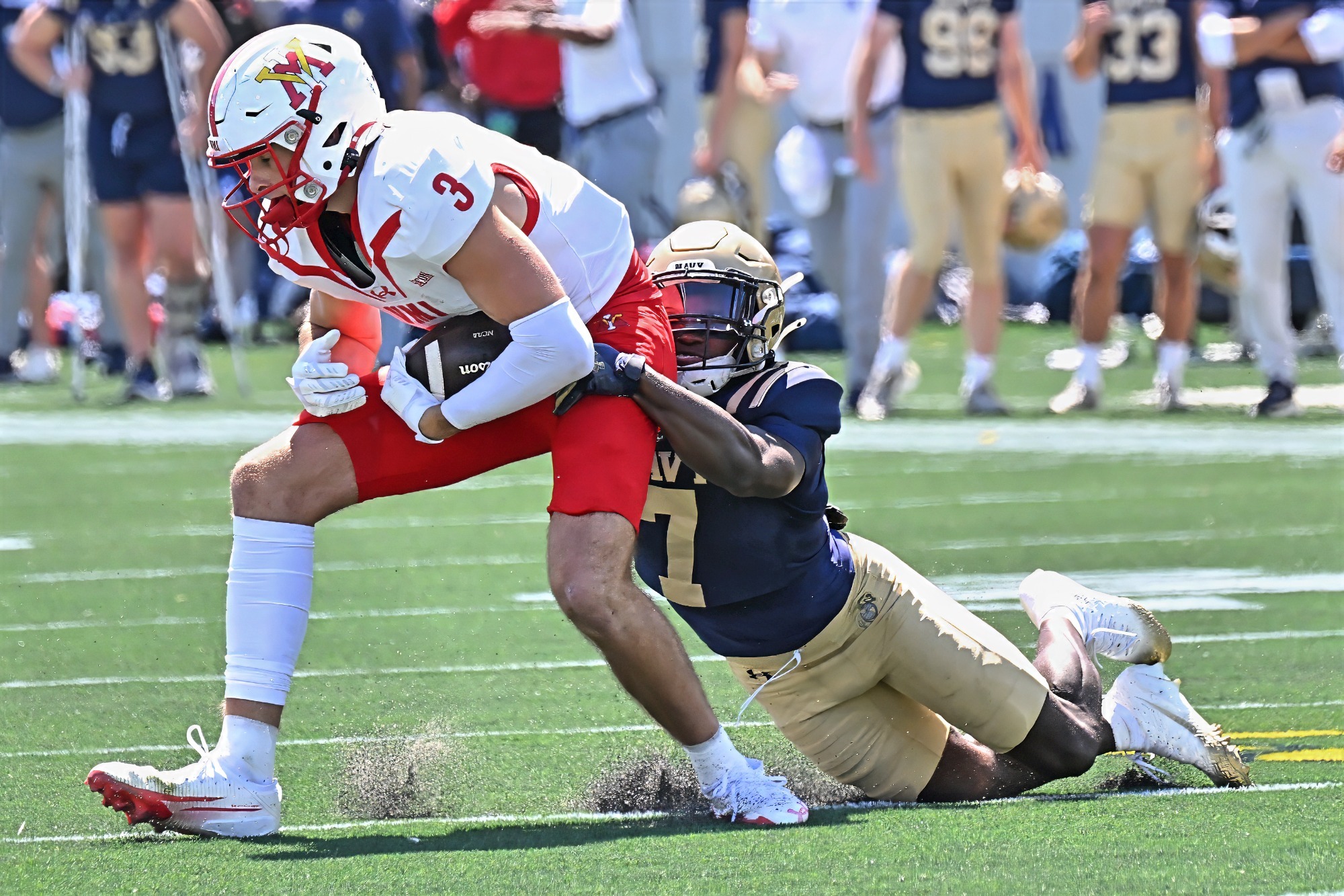 Abraham makes the tackle against VMI