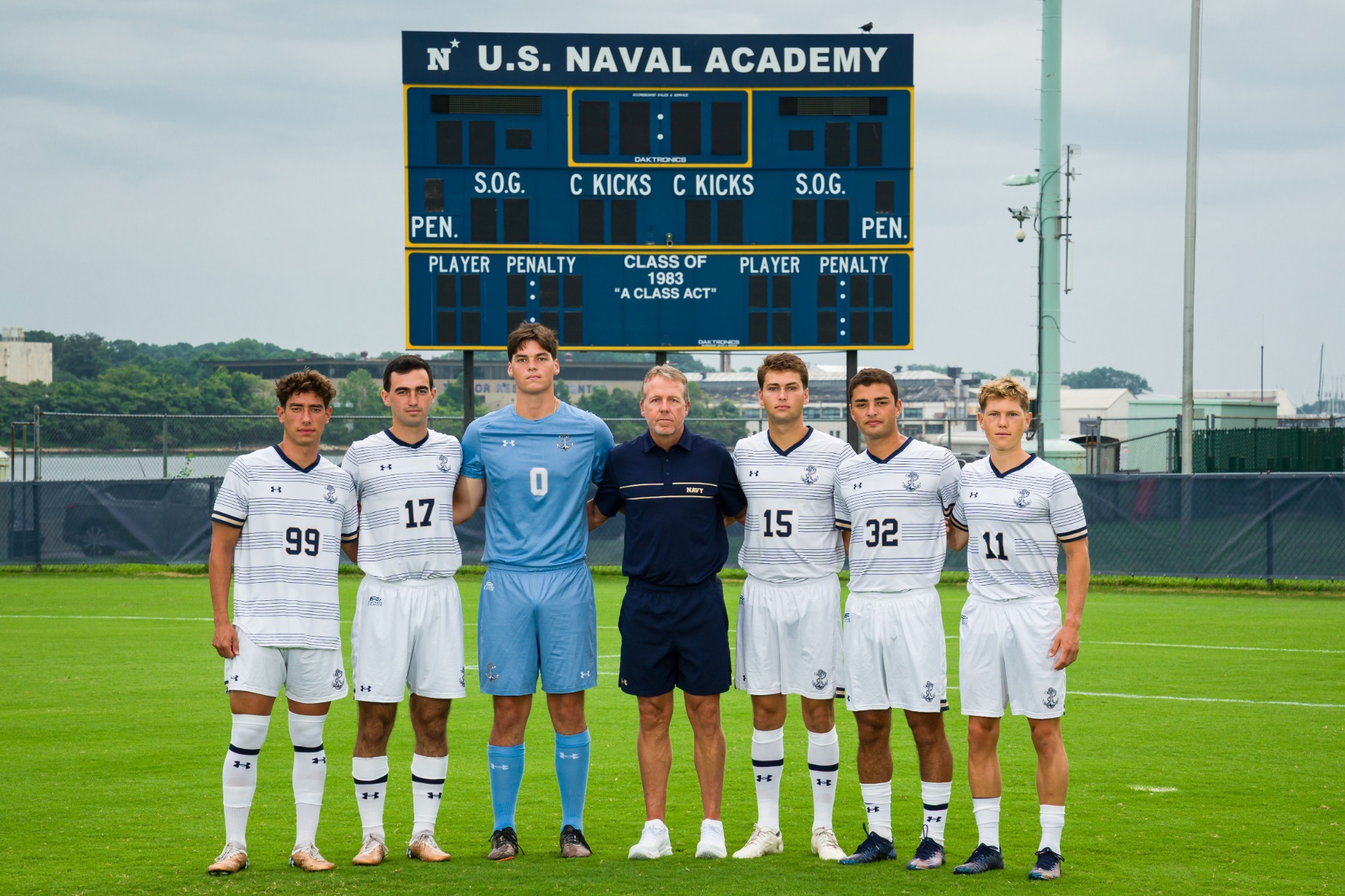 Men's Soccer Head Coach John Hackworth with the seniors