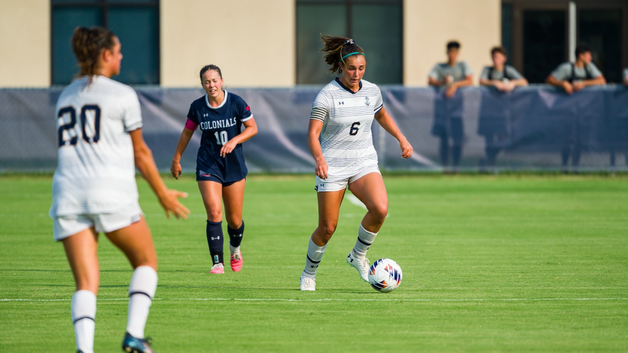 Ali Barrow looking to make a pass versus Robert Morris
