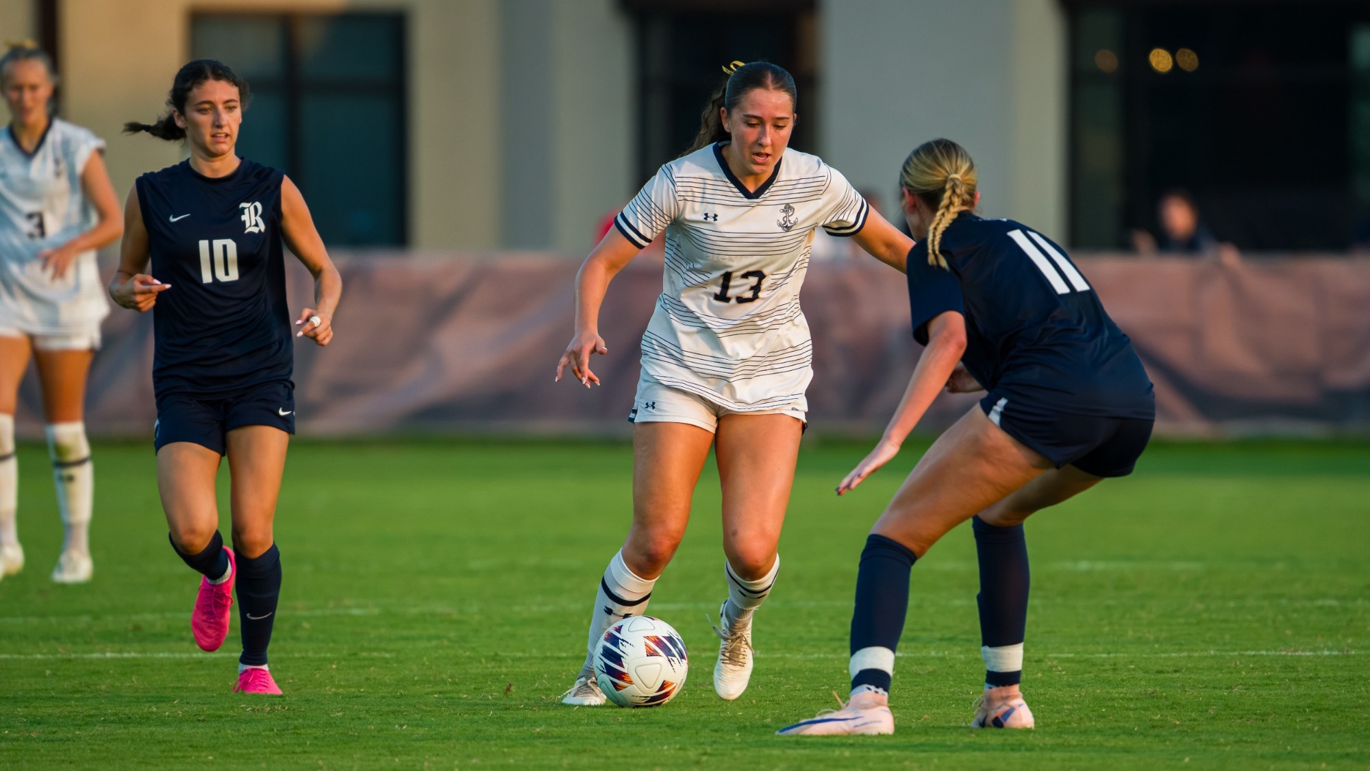 Ande Swan dribbles against a Rice defender on Aug. 15