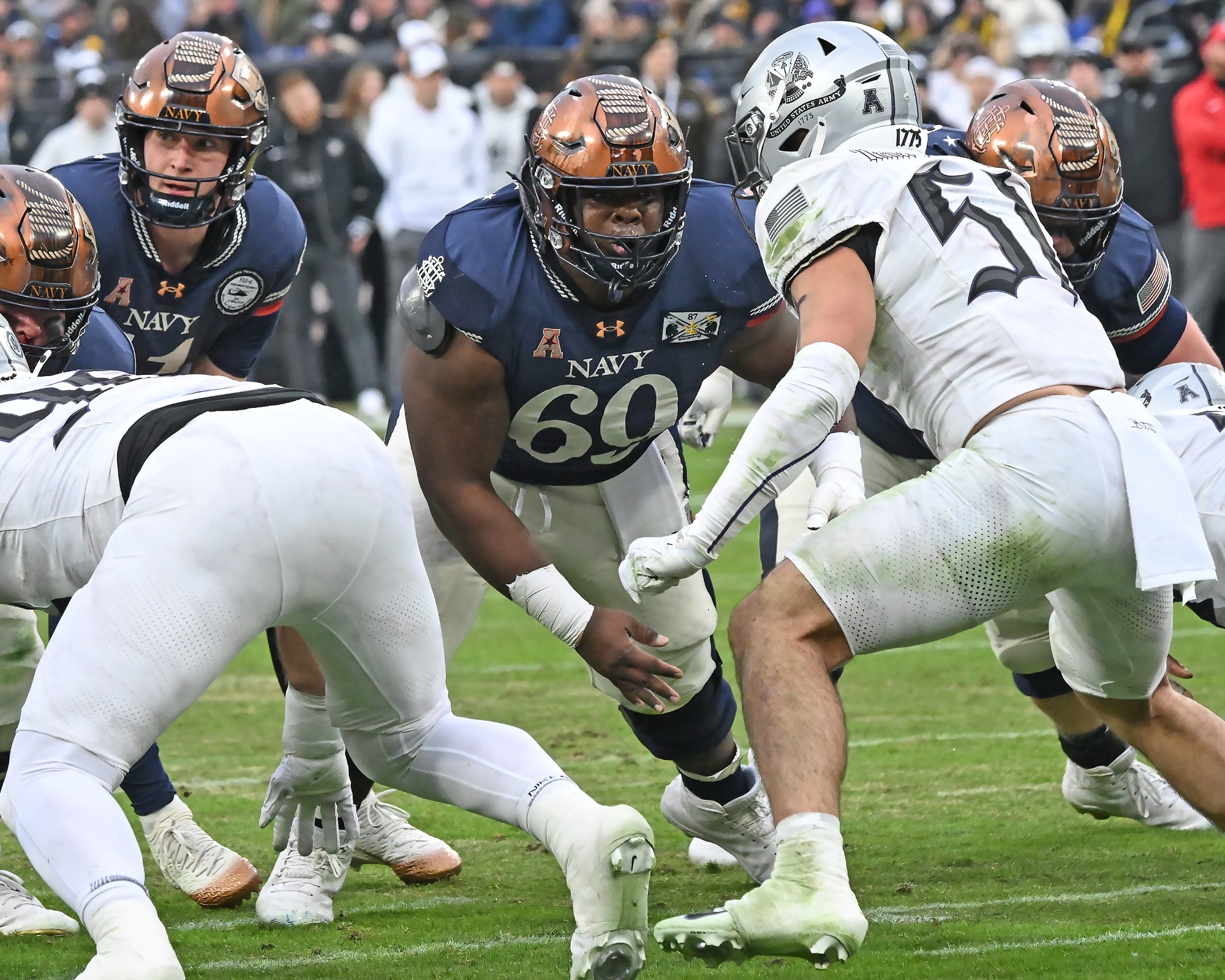 Cam Nichols exectutes a block against Army
