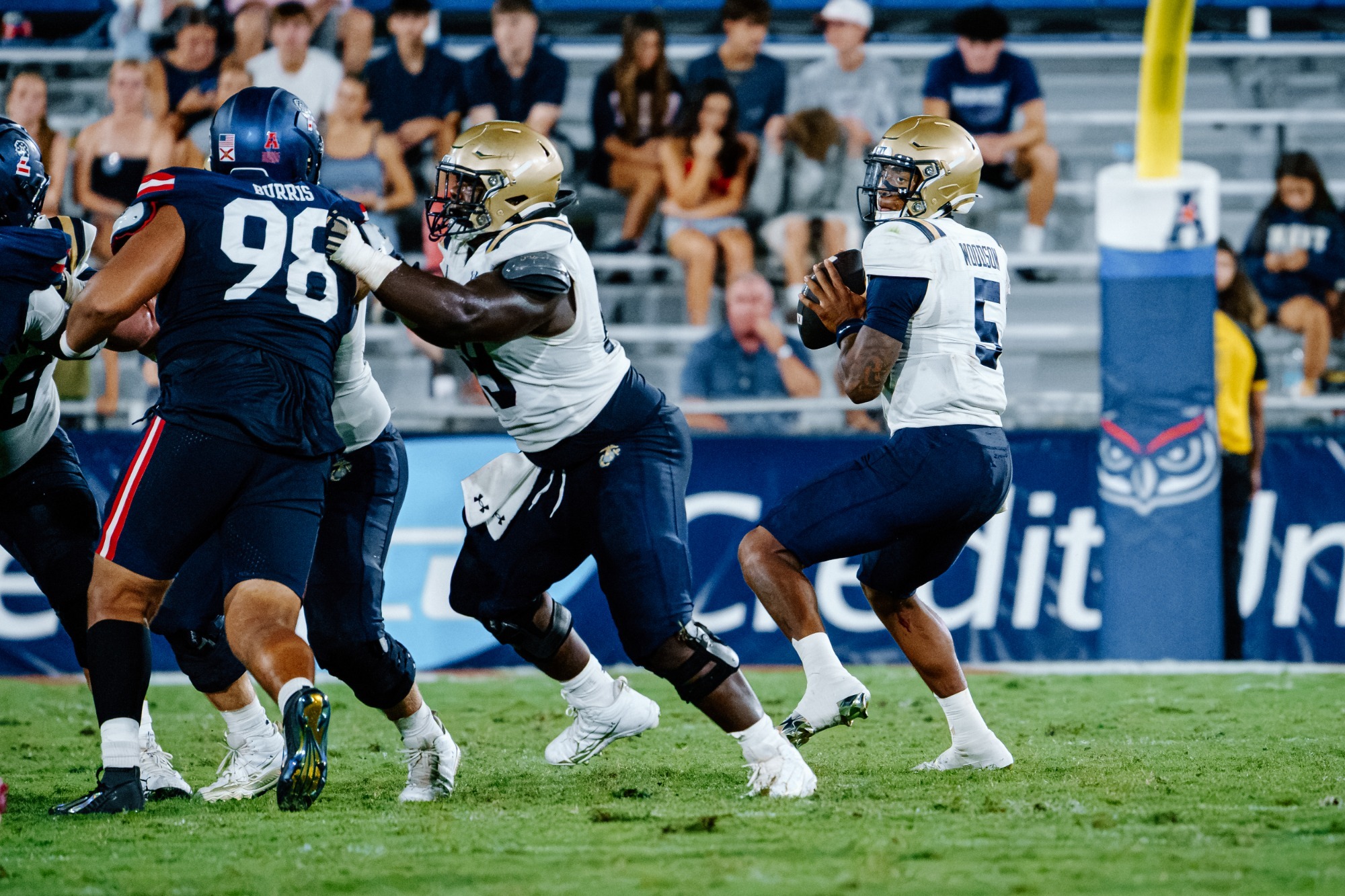 Braxton Woodson drops back to pass against FAU