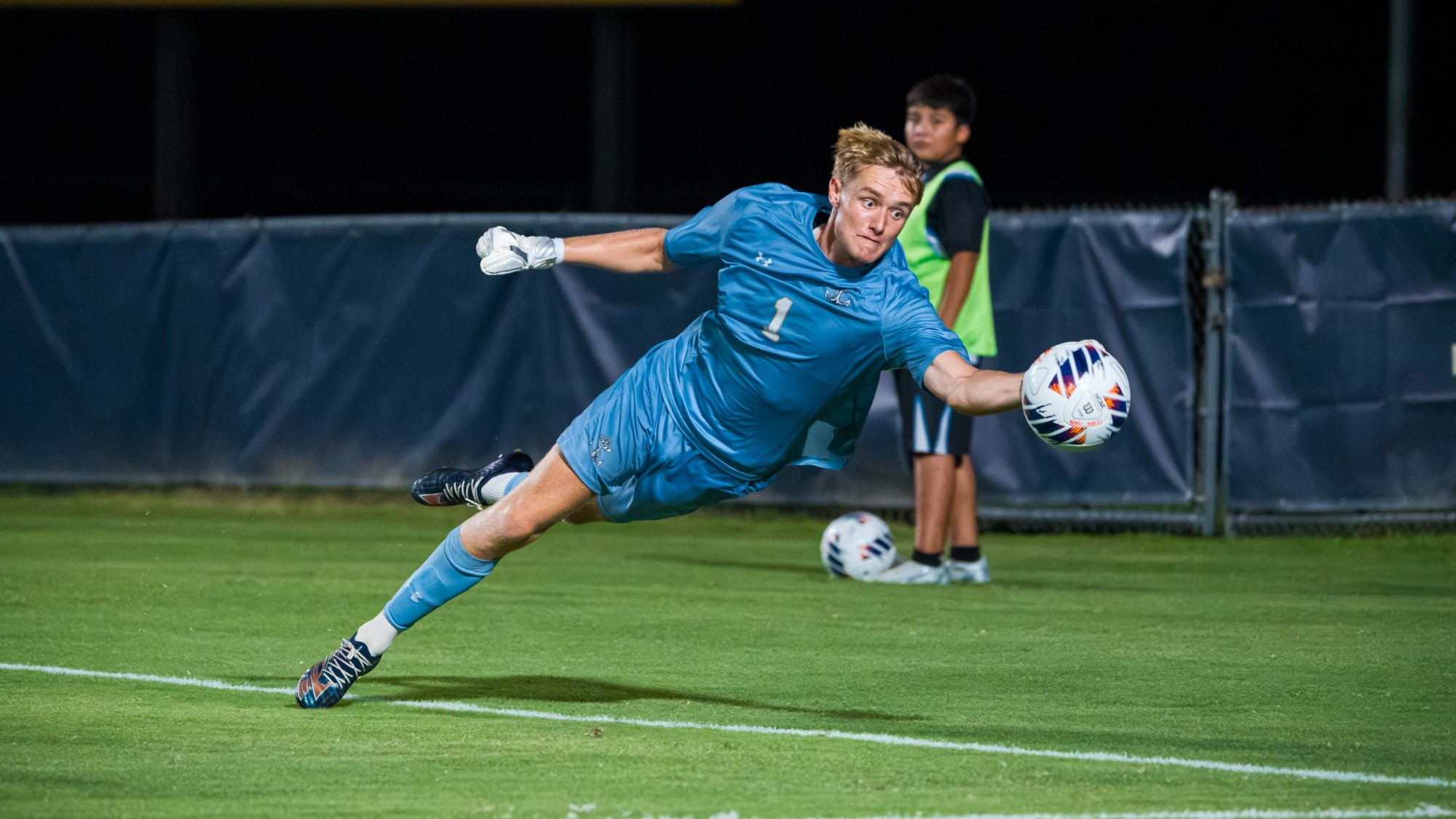 Navy sophomore goalkeeper Sam Clark makes a save against George Washington on Aug. 28, 2026 at Glenn Warner Soccer Facility in Annapolis, Md.