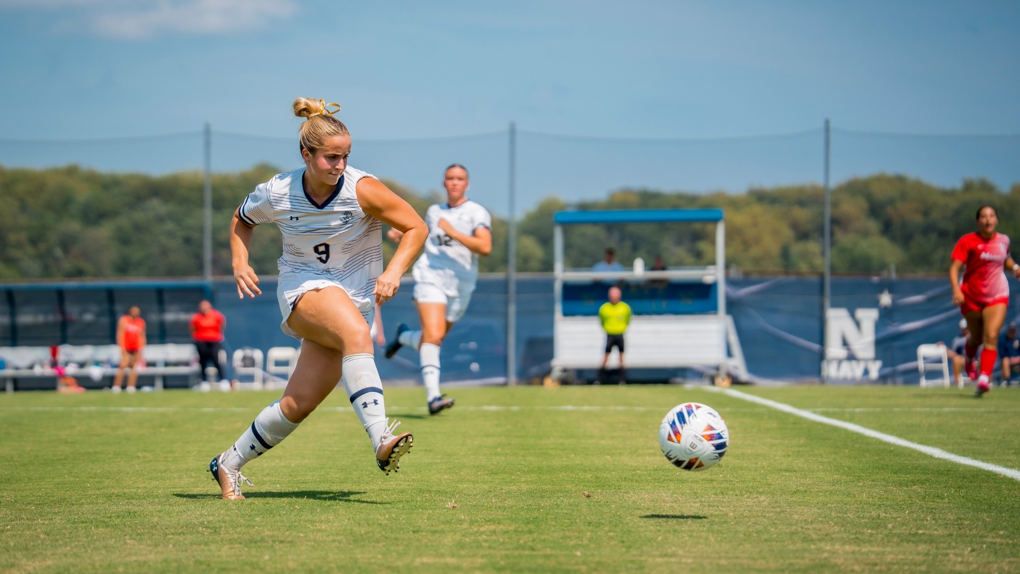 Hannah Mulholland passing during Navy-Marist women's soccer match