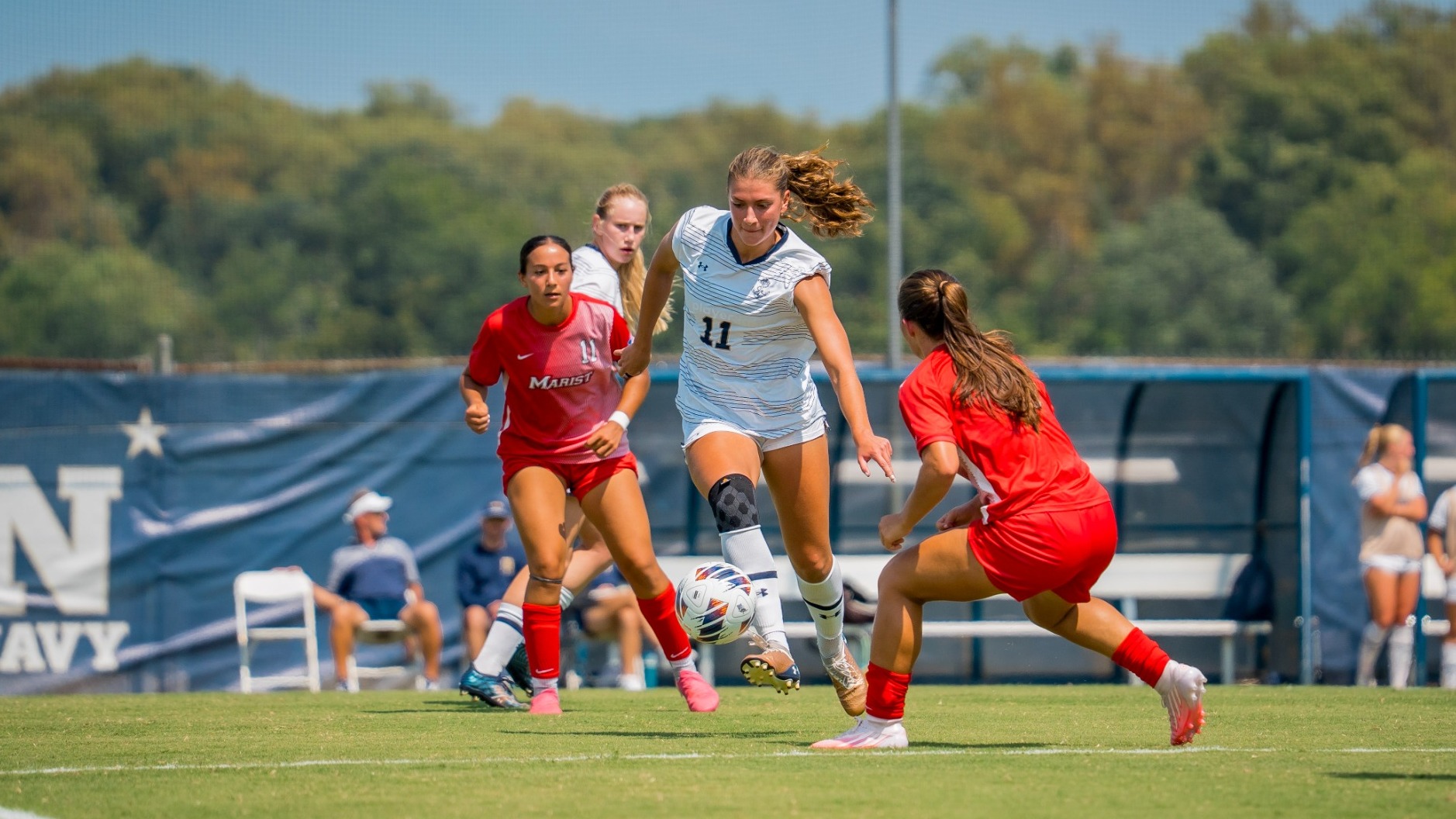 Katia Katsari-Hoefer dribbles past a Marist University defender