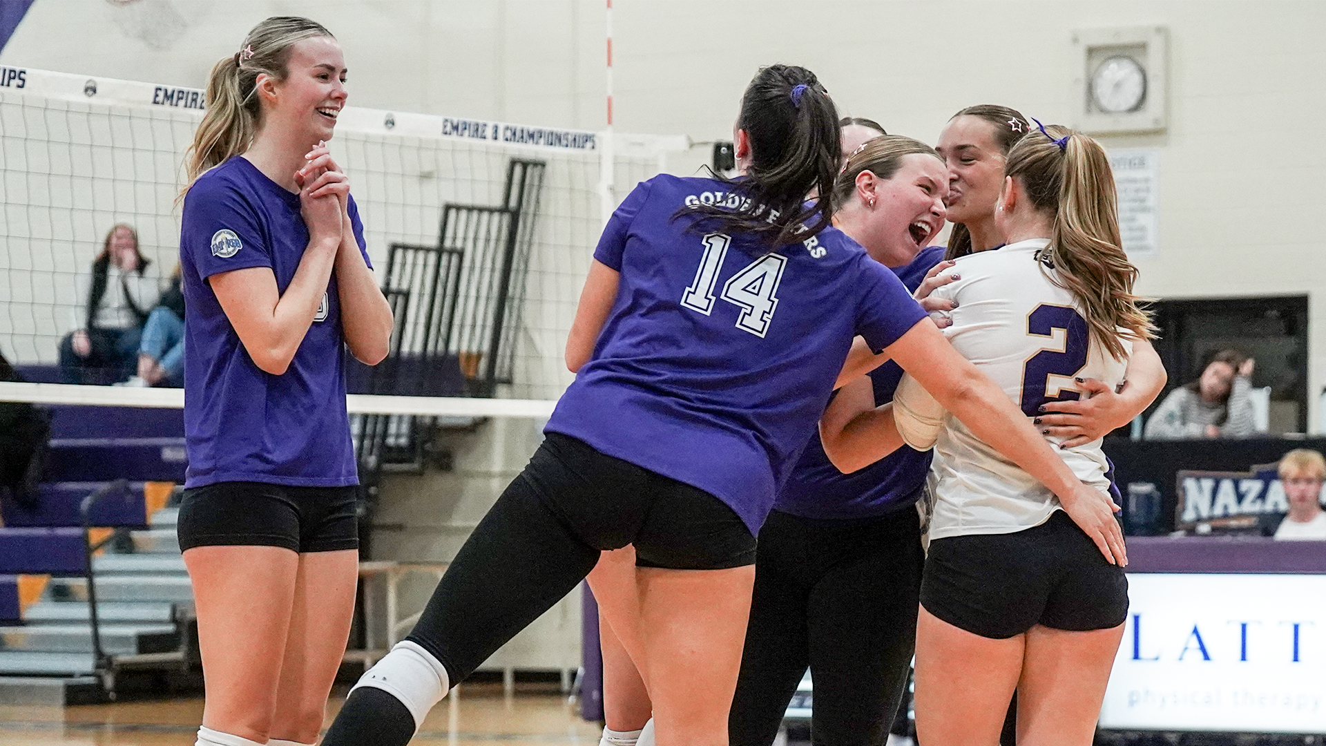 Women's Volleyball celebration huddle 