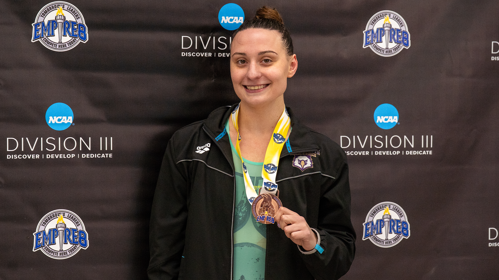 Emily LeFrois-Heath with bronze medal 