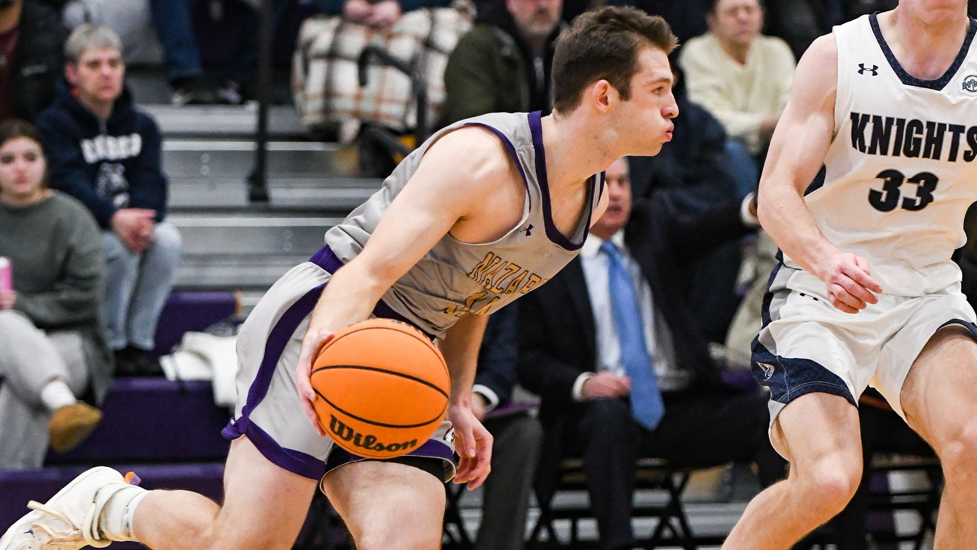 Luke Insley dribbling vs Geneseo 