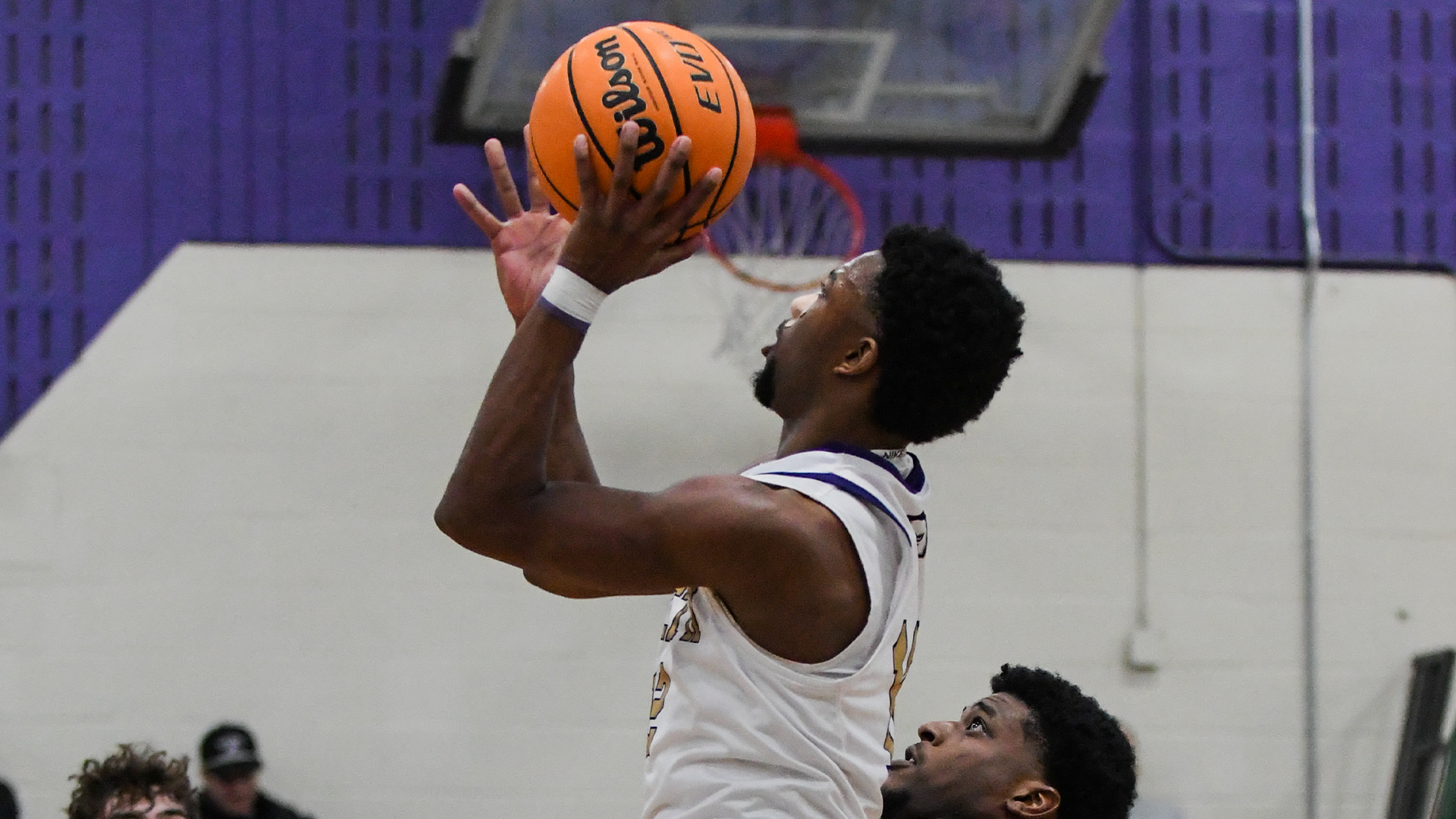 Jaylen Savage driving to basket vs Brockport