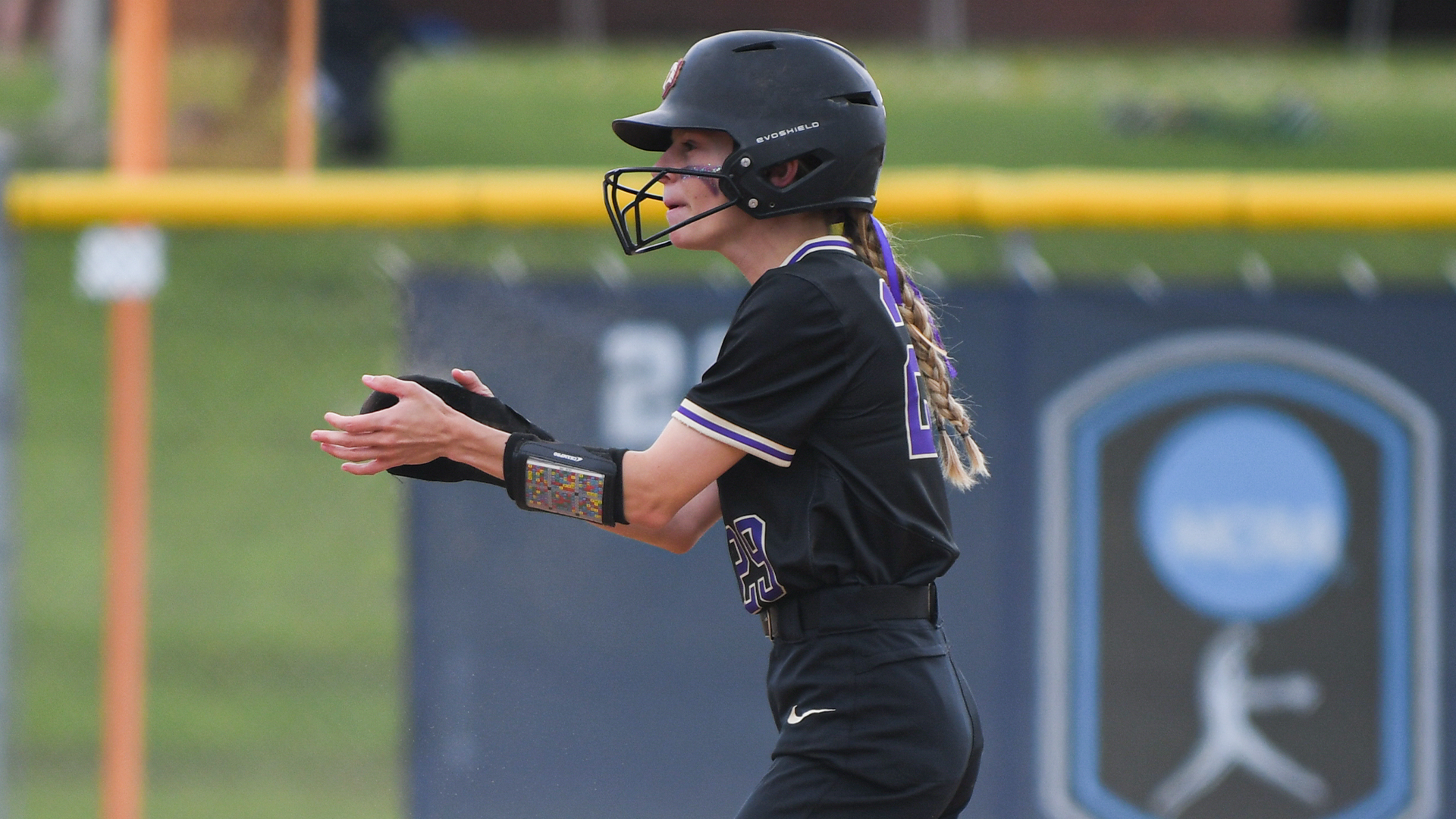 Alexis Brown clapping on second base against Alfred 