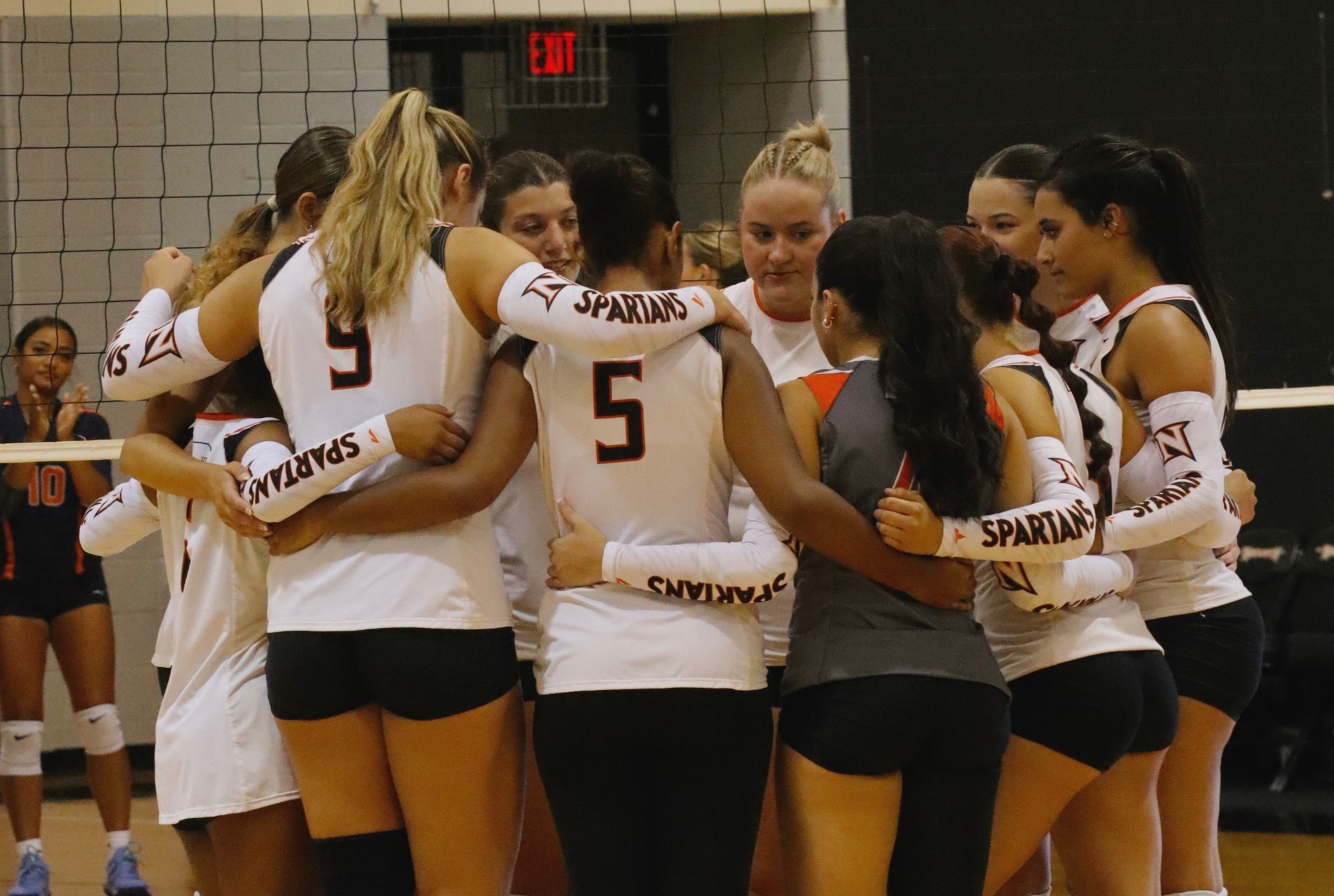 Women's Volleyball Team Huddle