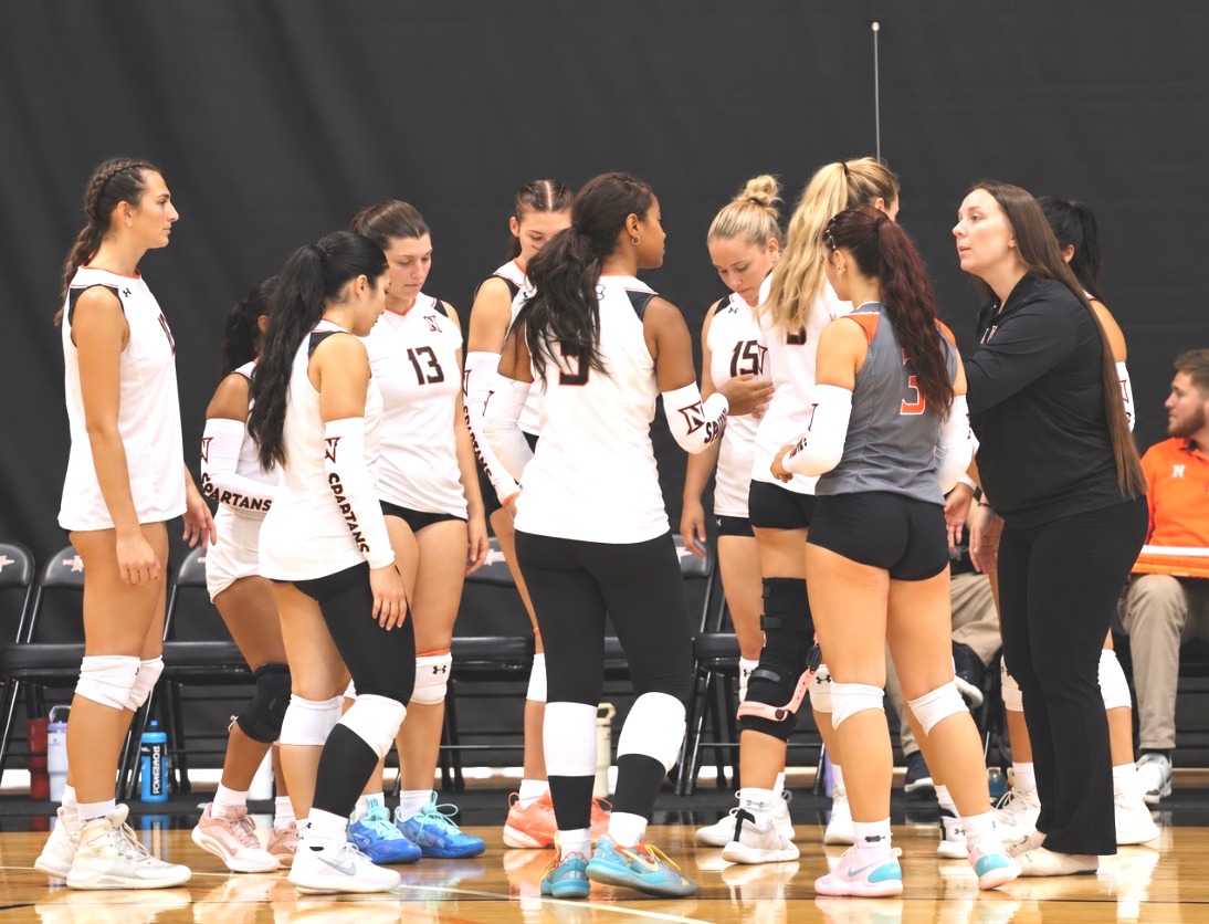 Women's Volleyball Timeout on Court