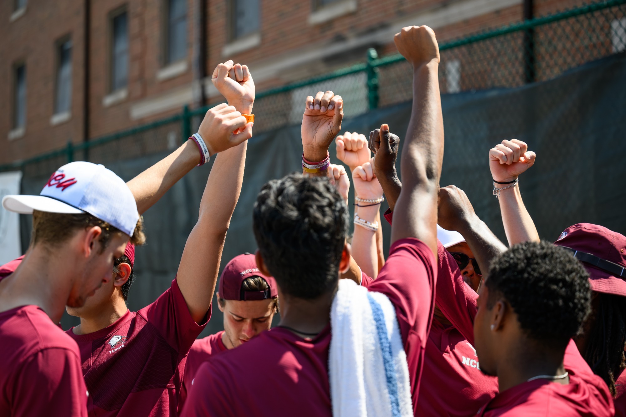 Mens tennis huddle 2026