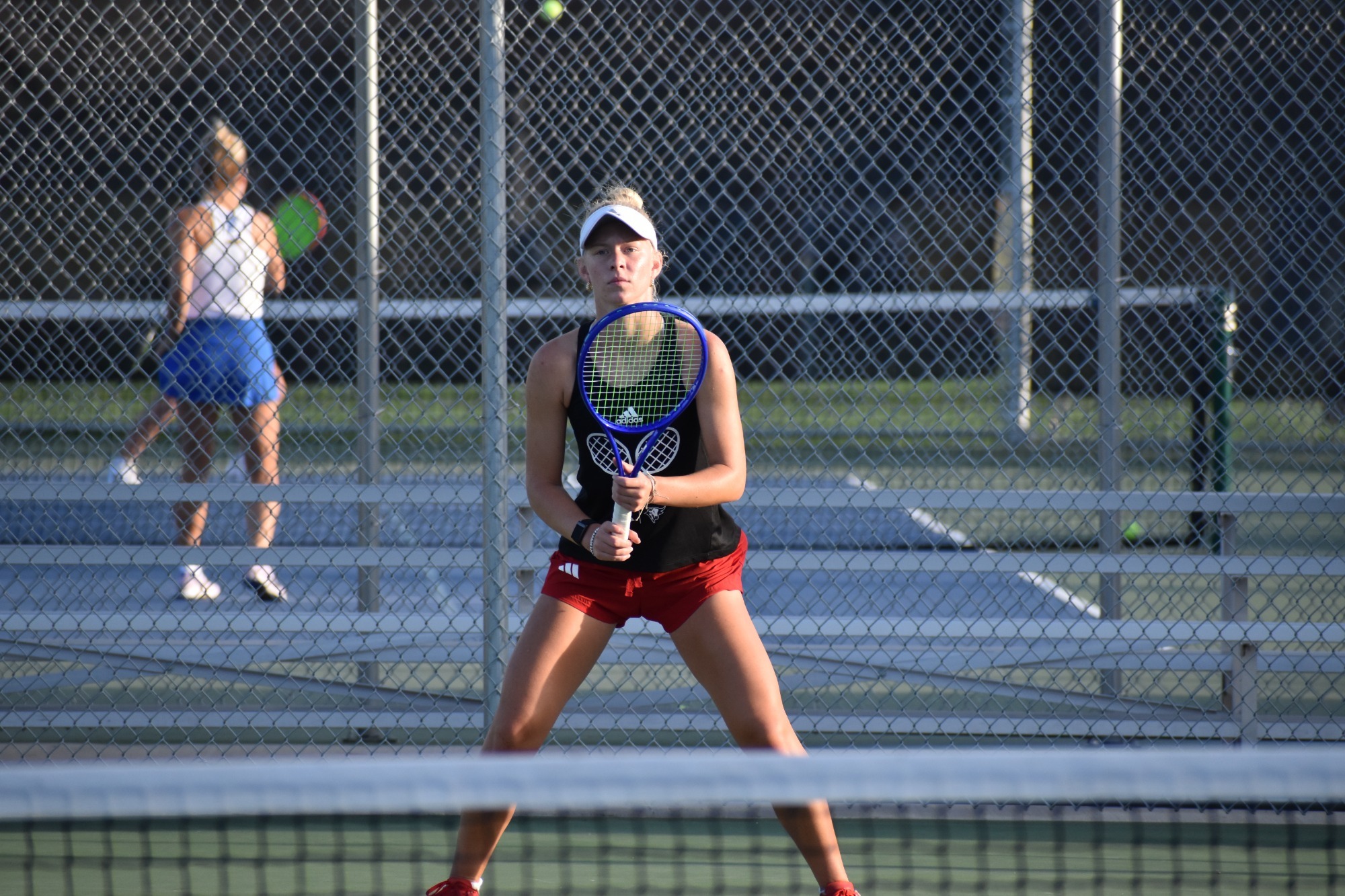 Katelynn Kock waiting to receive a serve
