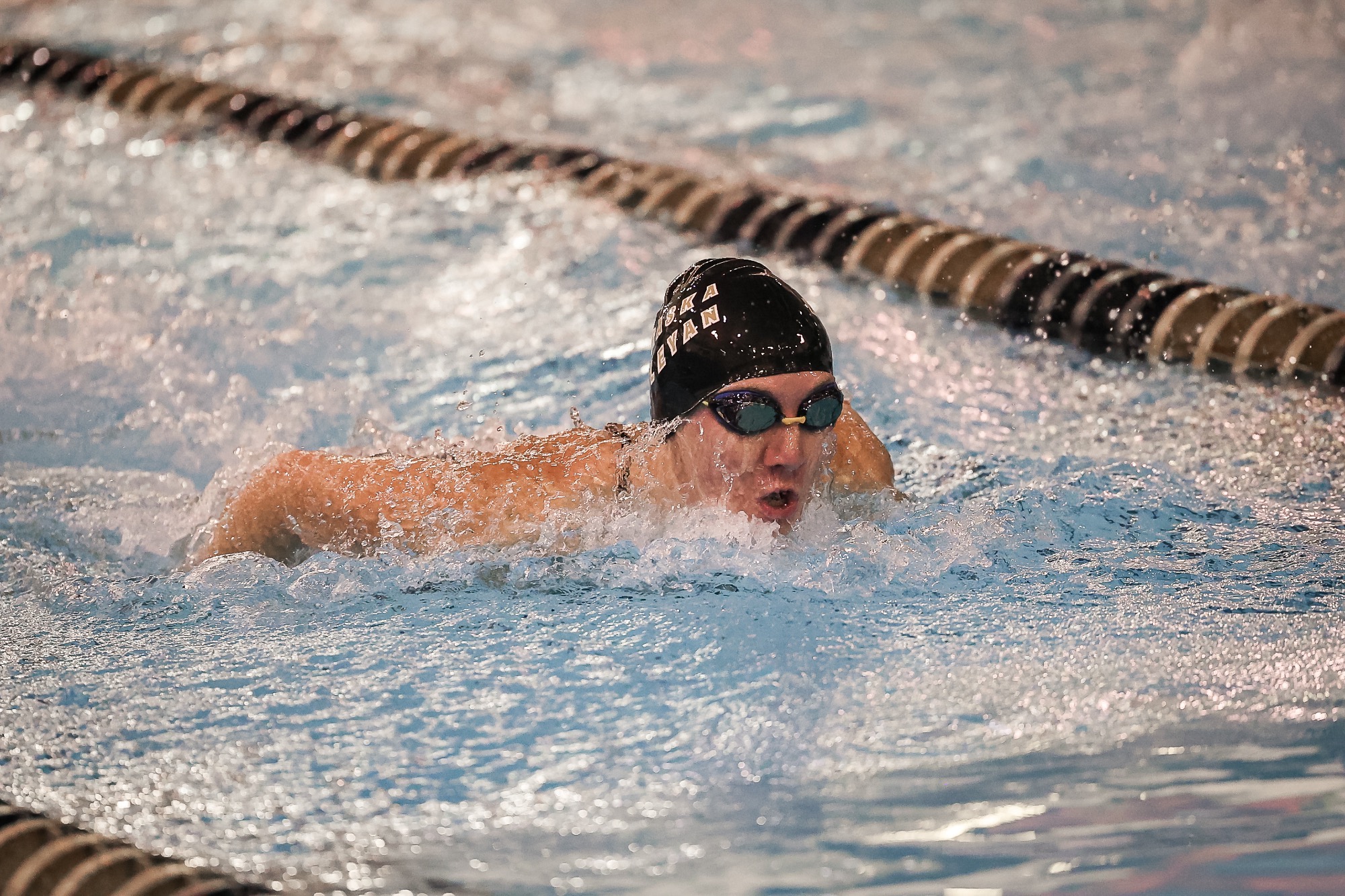 Hannah Gibbs swims the butterfly