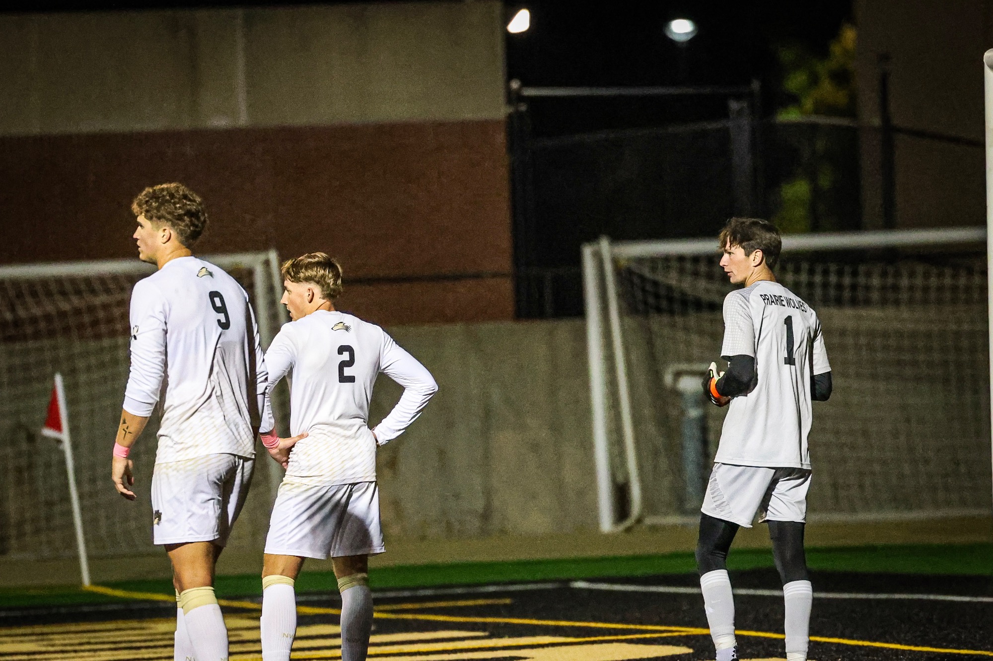 Graedon Hilton, Brenden Zuerlein and Isaac Havemeir await an opponent attack near the goal