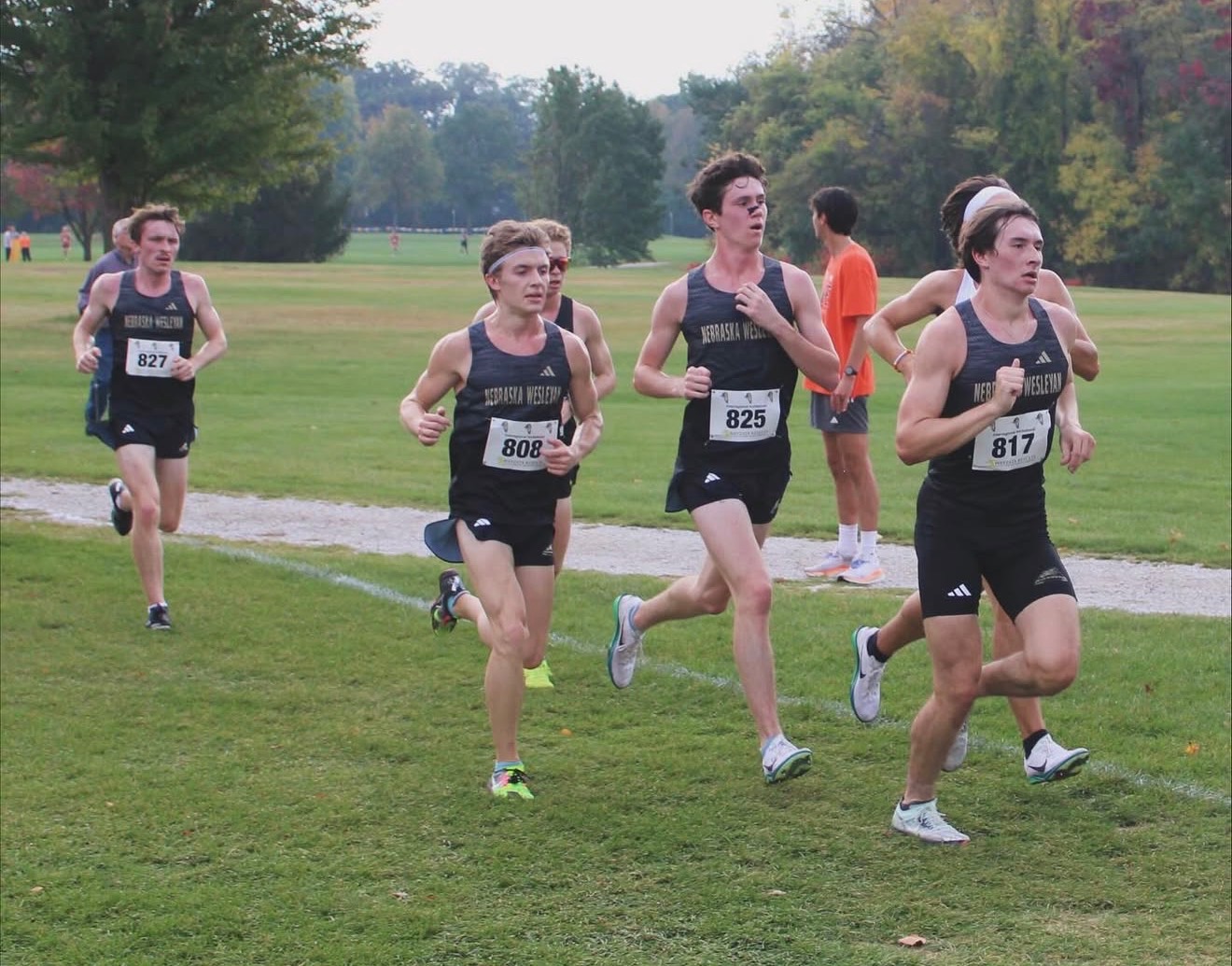 Evan Brown runs in a group of Prairie Wolves