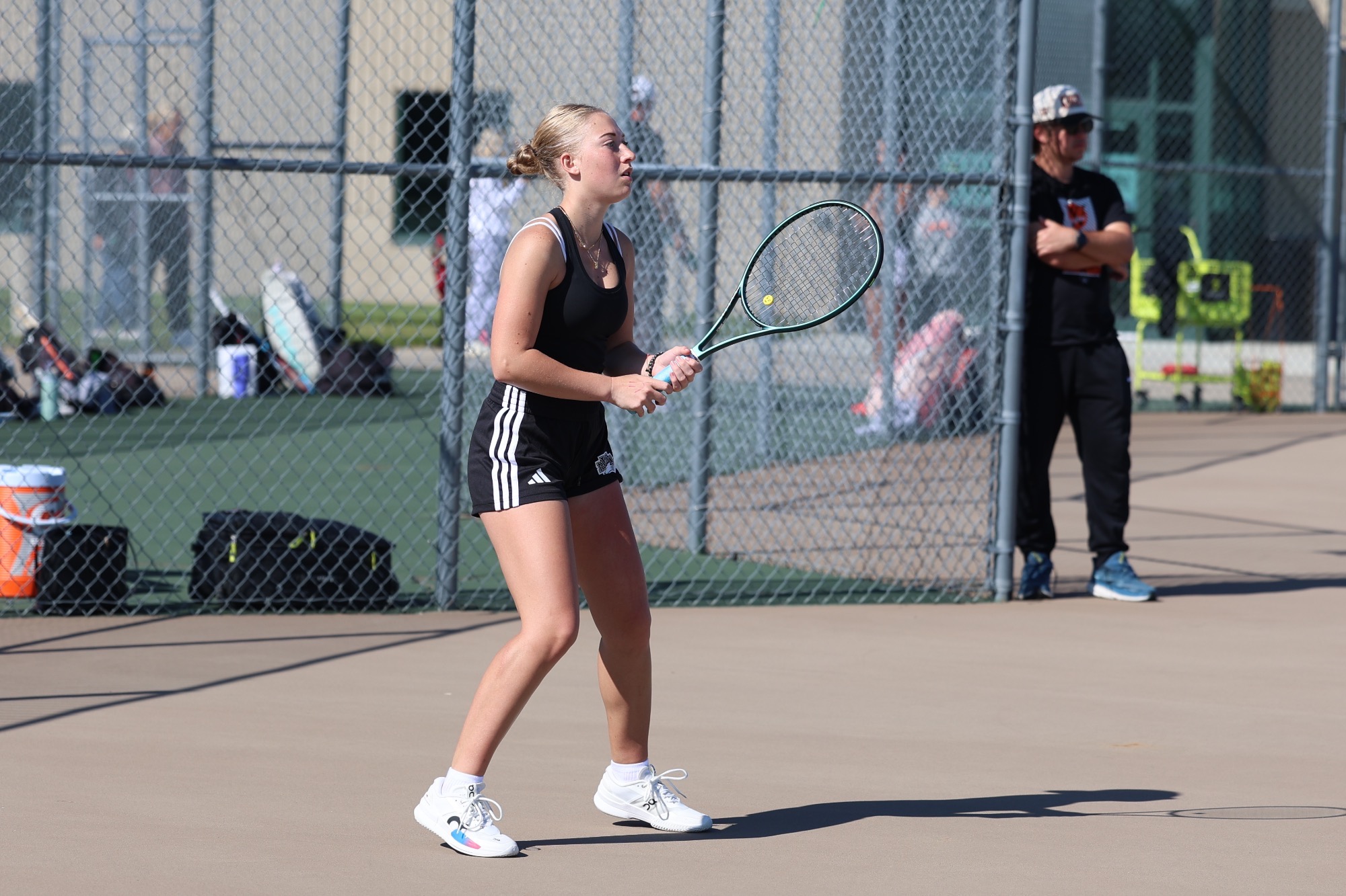 Kylie Engelsman bounces around awaiting a serve.