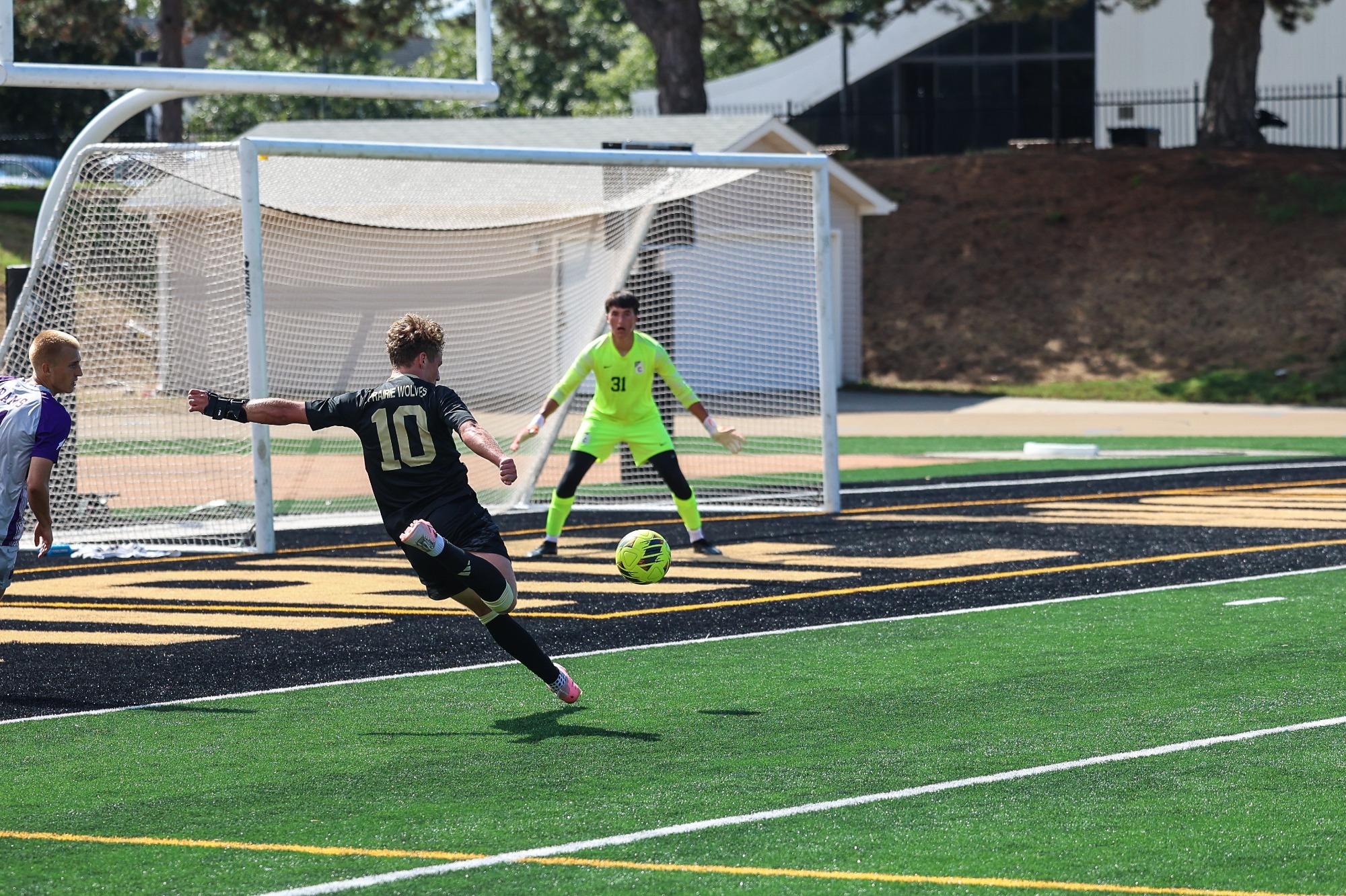 Owen Glogowski fires a shot at an opposing goal keeper