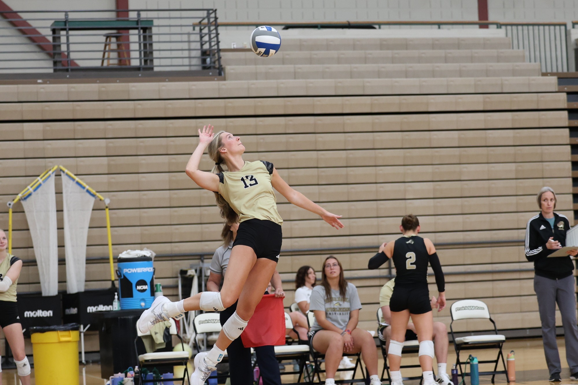 Ava Stone spikes the ball against NPCC