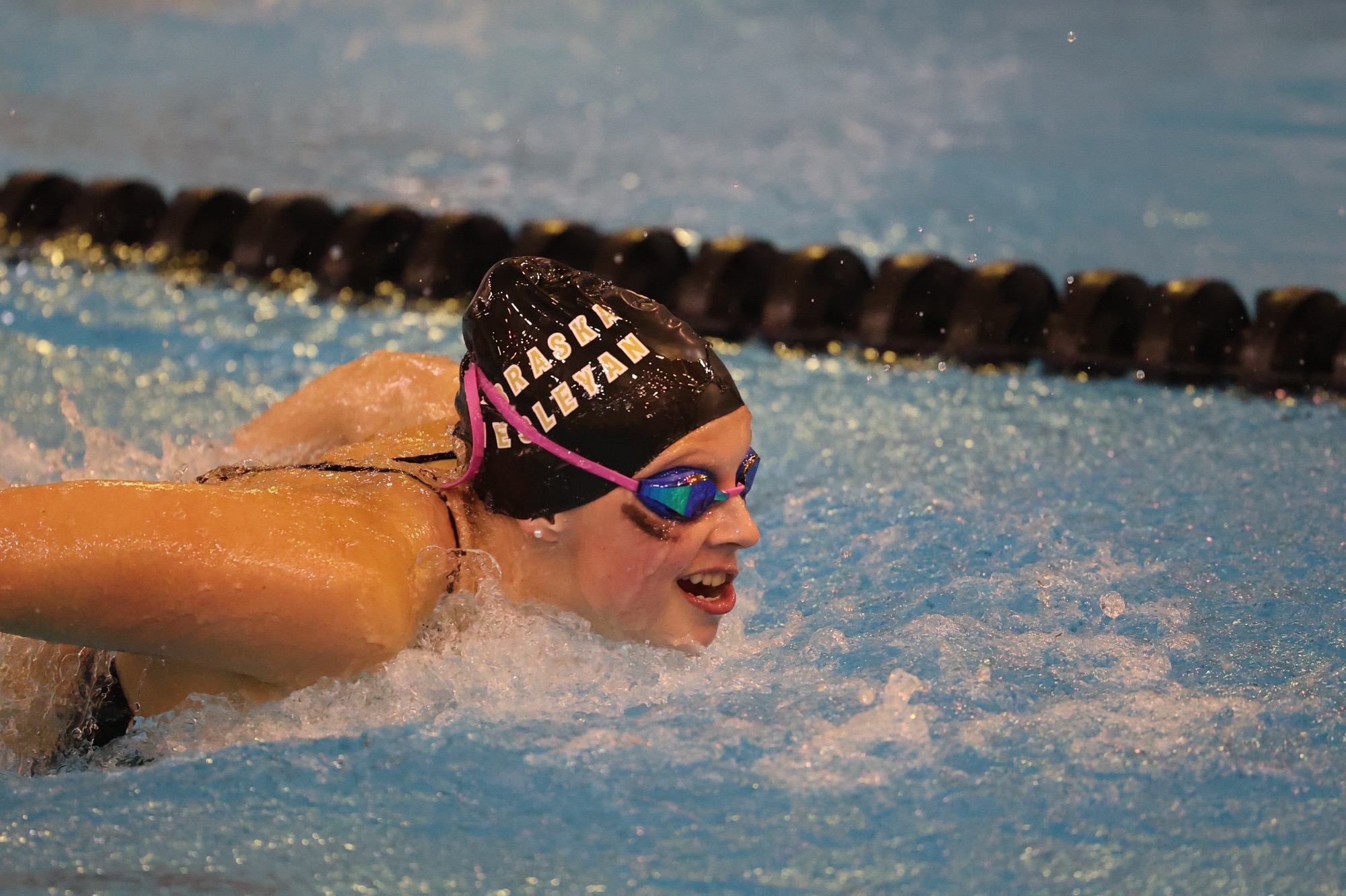 Ryleigh Schroeter swims the fly in the dual vs. Minnesota Morris