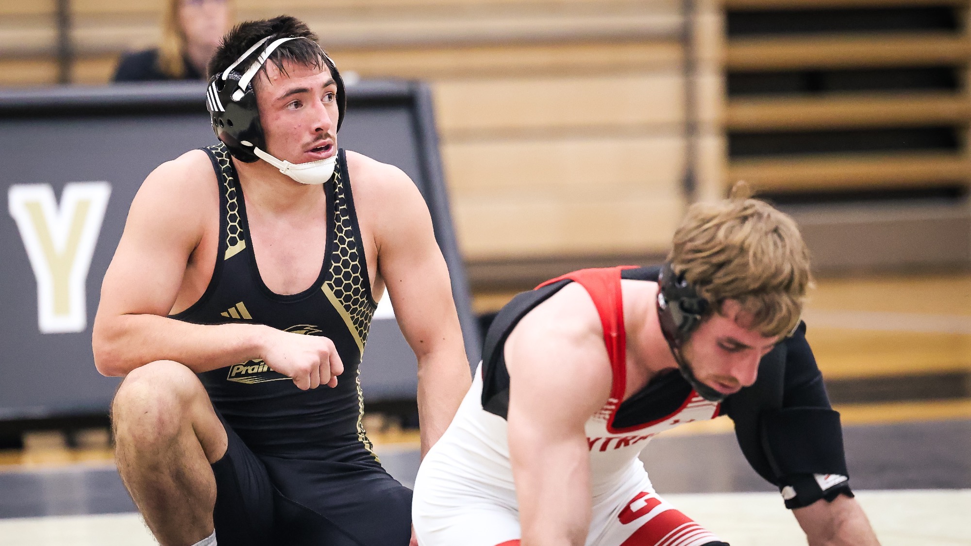 Cy Peterson waits for an official ruling on the mat