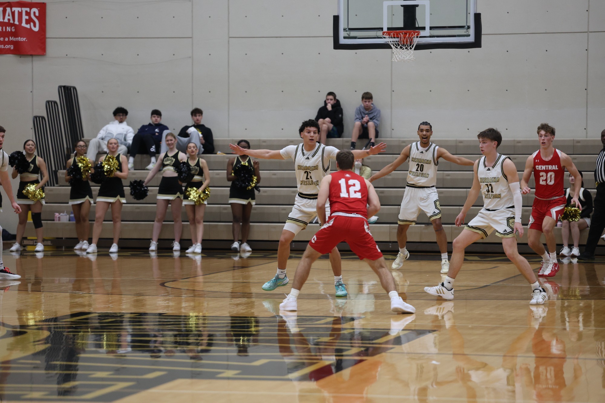Nebraska Wesleyan defends Central in the front court during a conference game at Snyder Arena