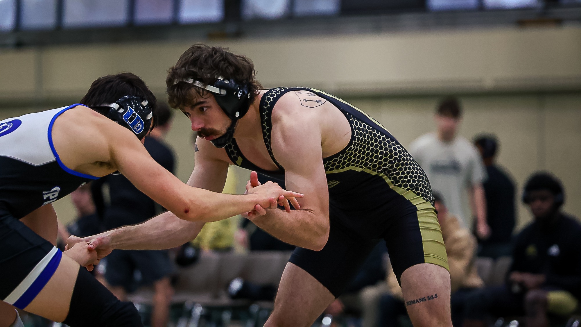 Nathan Rowden hand fights with Dubuque opponent