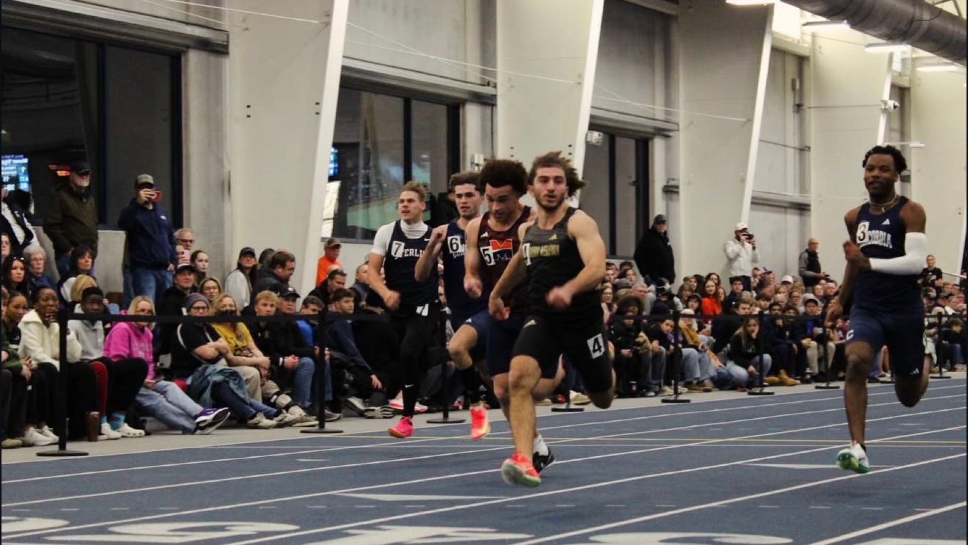 Ghaith Taha wins the 60 meter dash