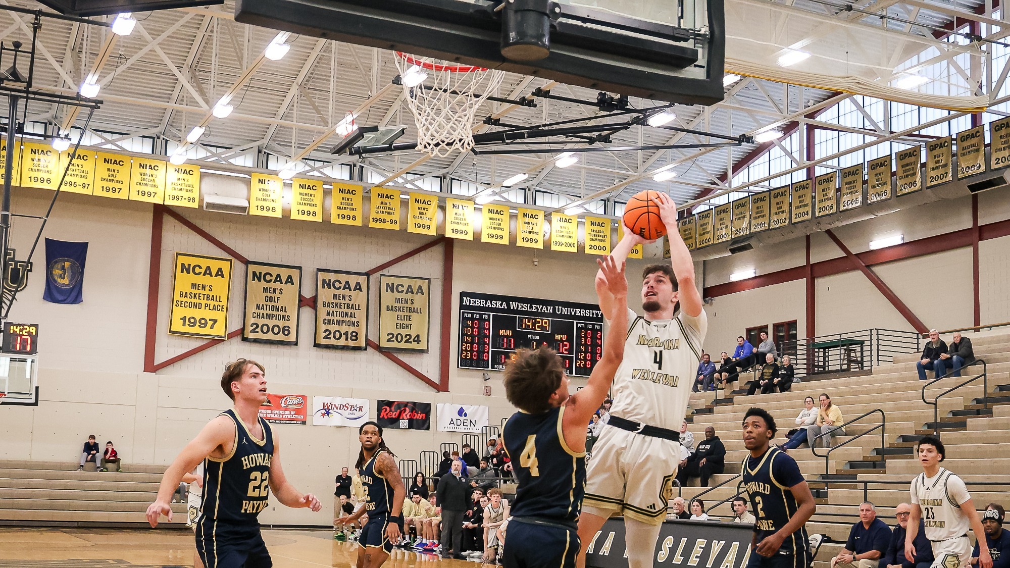 Seth Newton puts up a turn around jumper over a smaller defender.