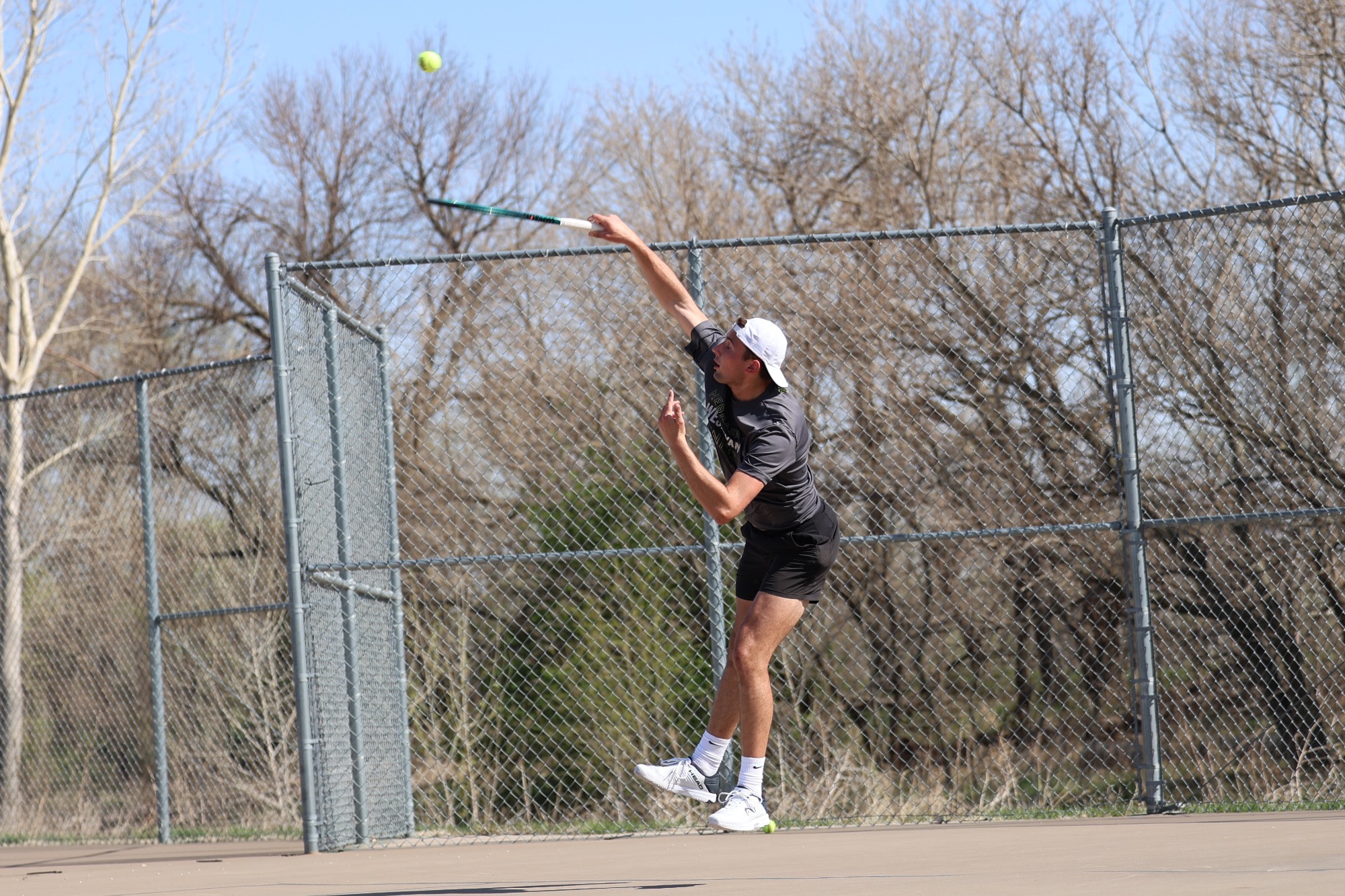 Ian Armbrust delivers a jump serve.