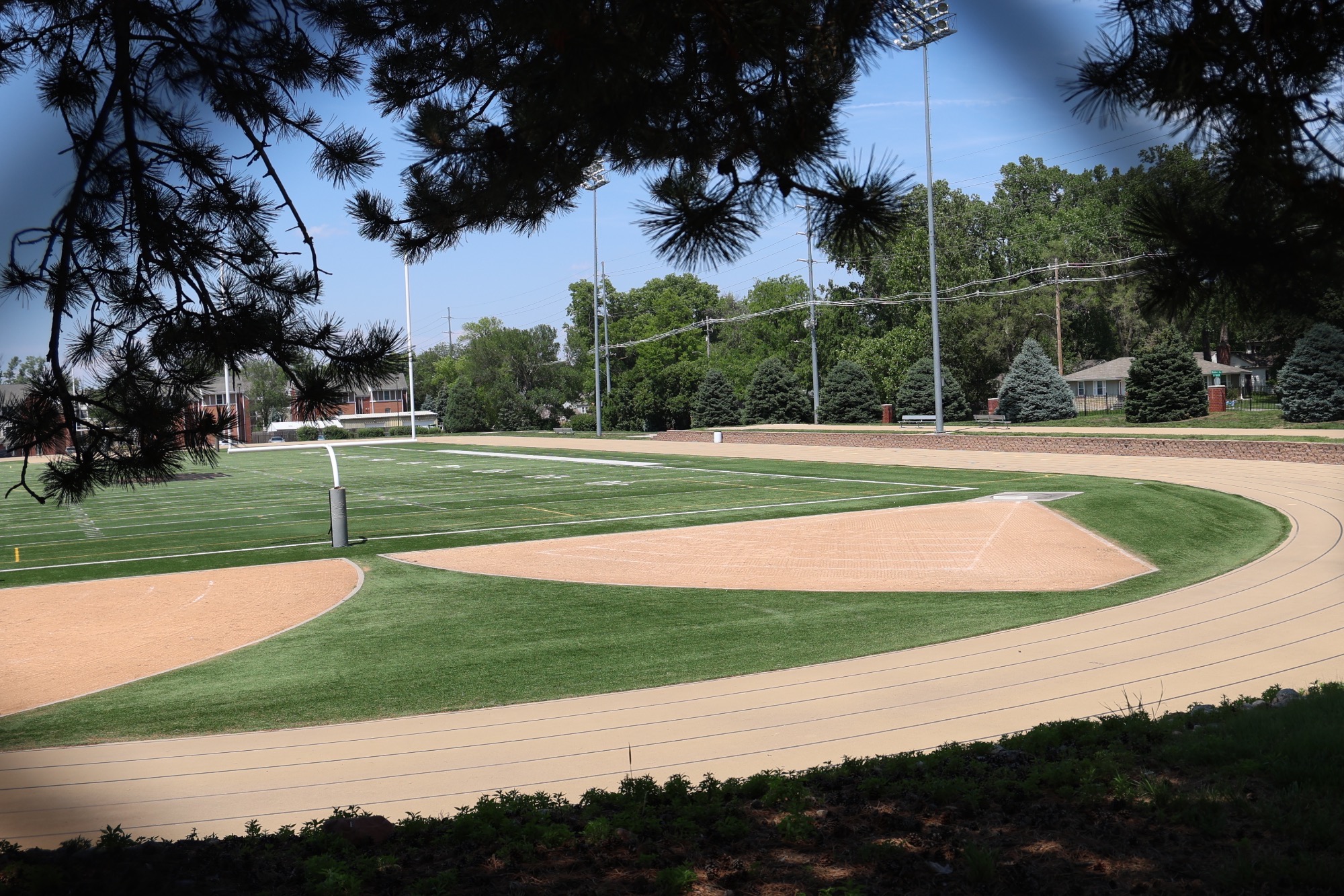 Greeno Track picture behind the trees