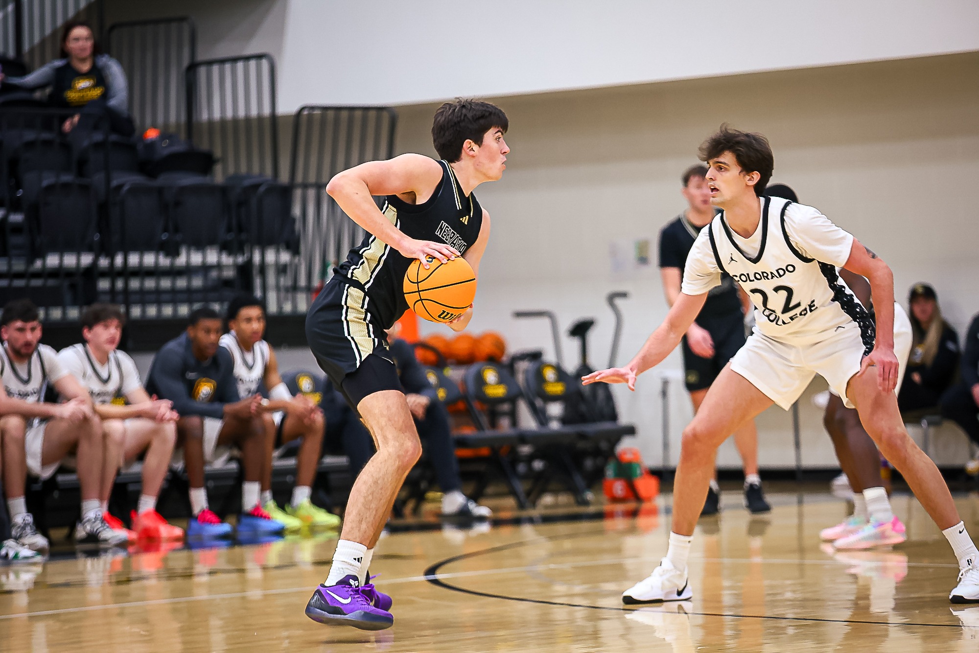 Nick Howard stands in triple threat at Colorado College