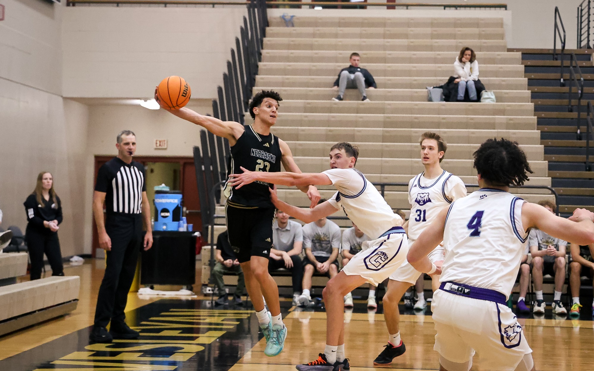 Christian Winn delivers a pass along the baseline
