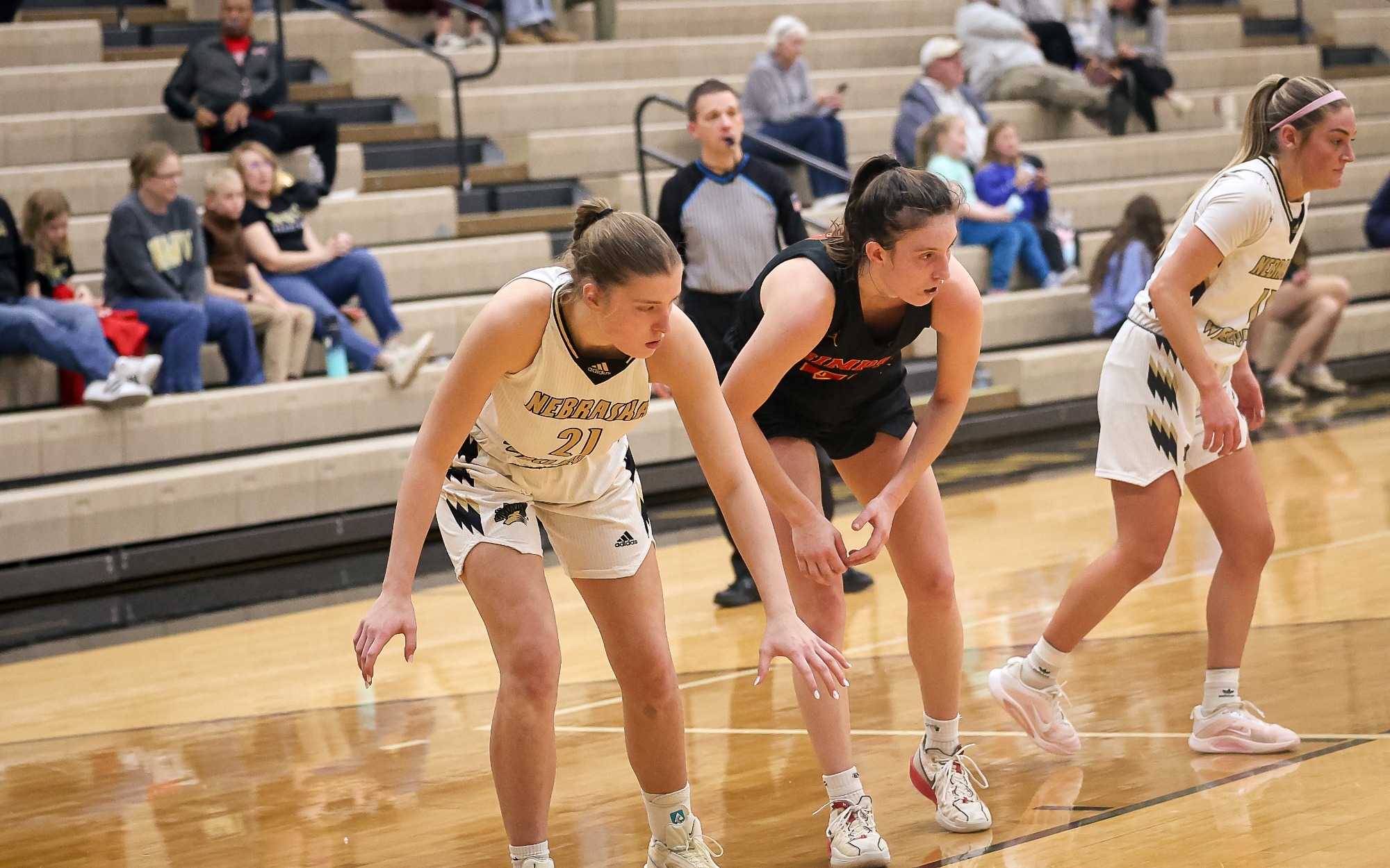 Caroline Eastman boxes out a Simpson opponent