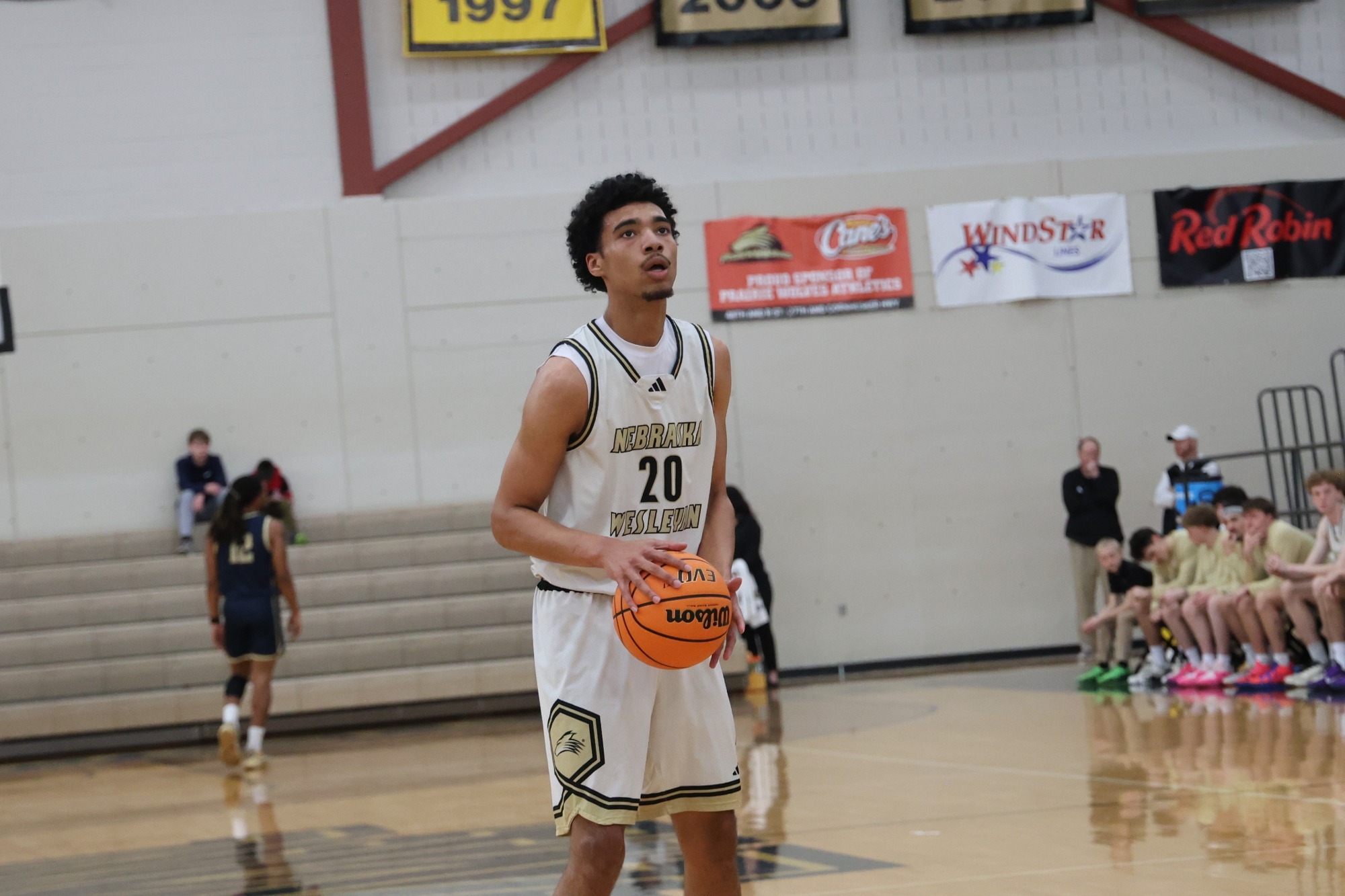 Devin Holmon shoots a free throw against Coe