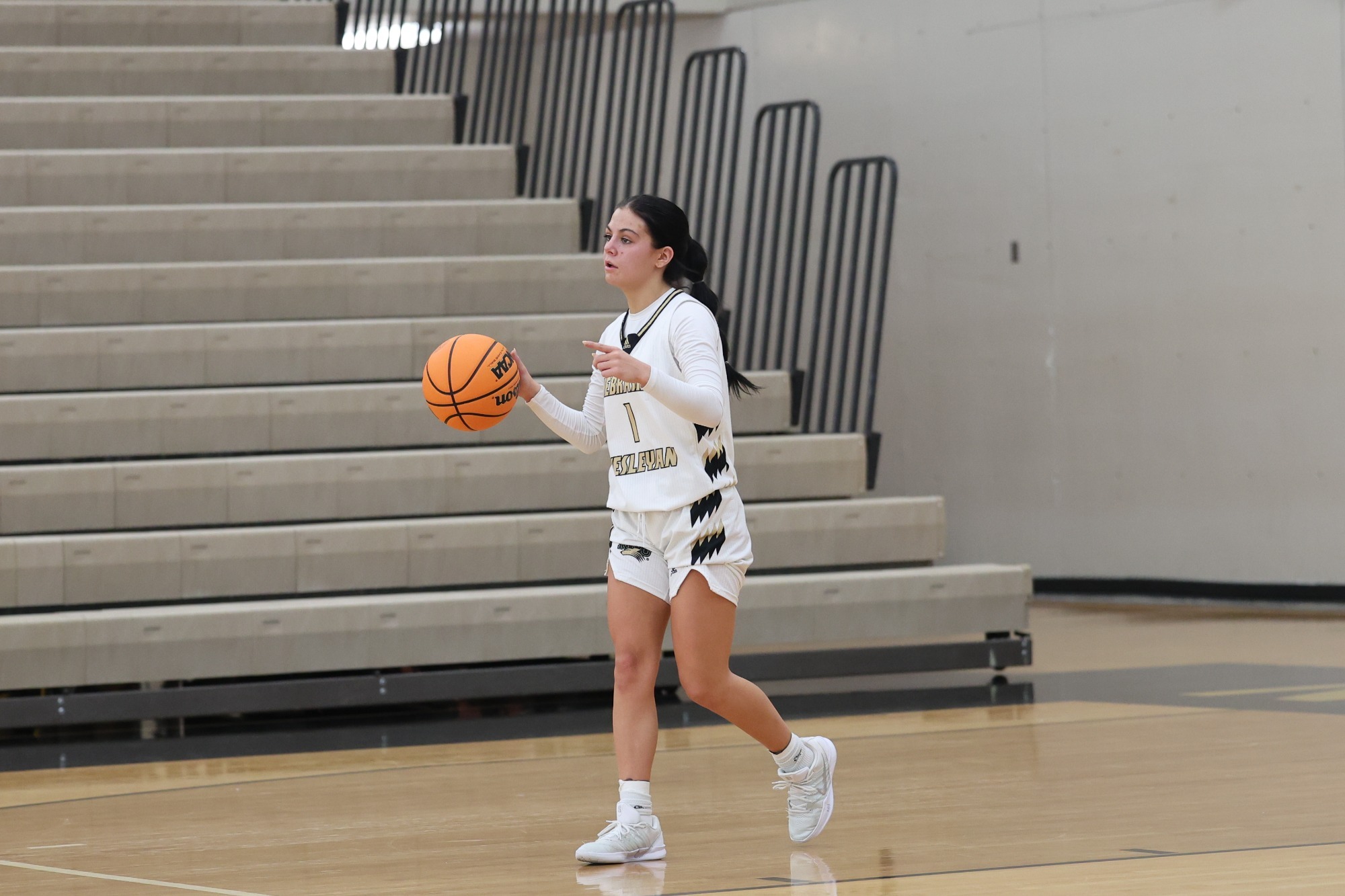 Maddie Demke directs the offense against Grinnell