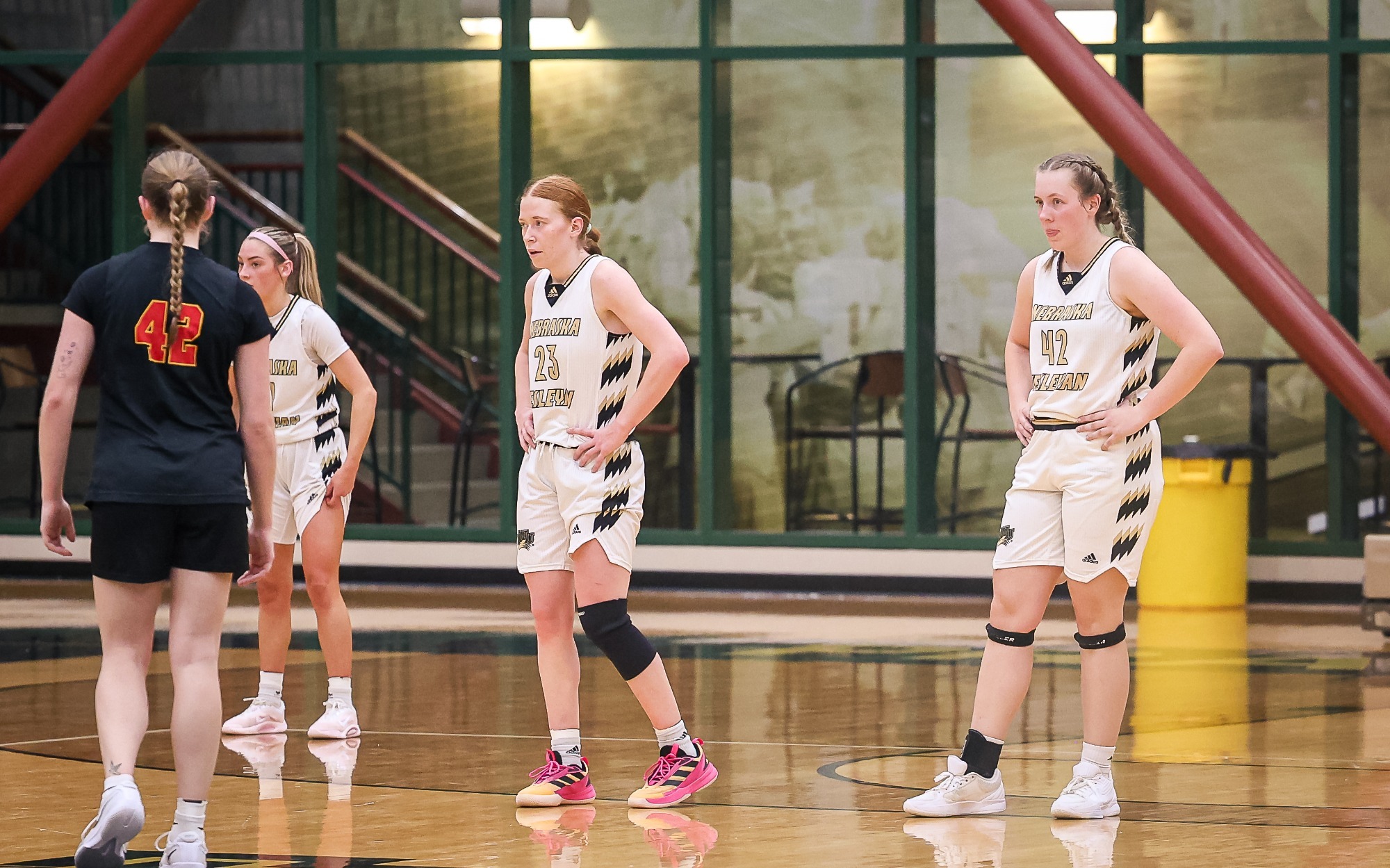 Carney Black & Alison Davis stand defensively