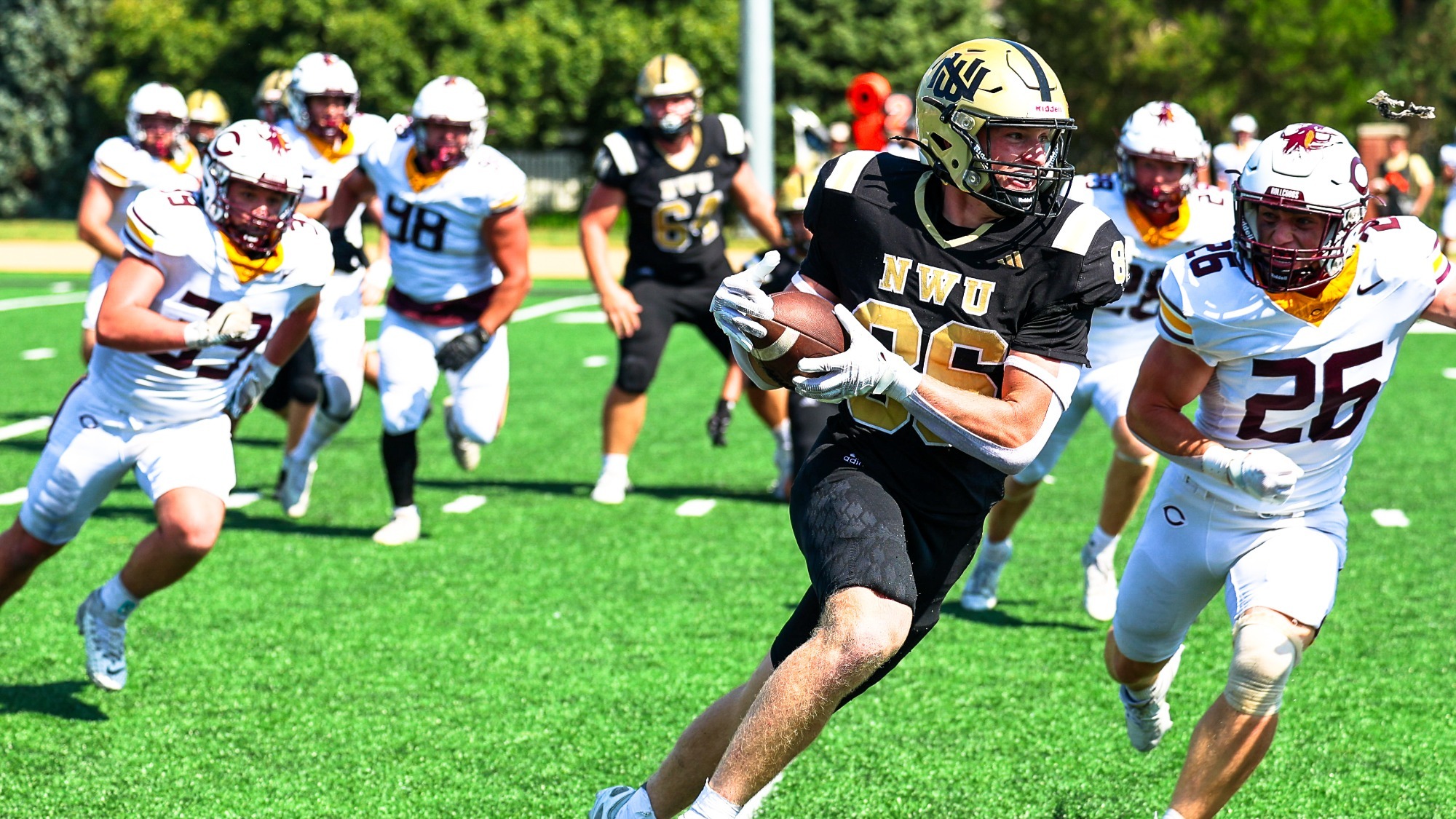 Jase Guntle turns upfield after catching a pass.