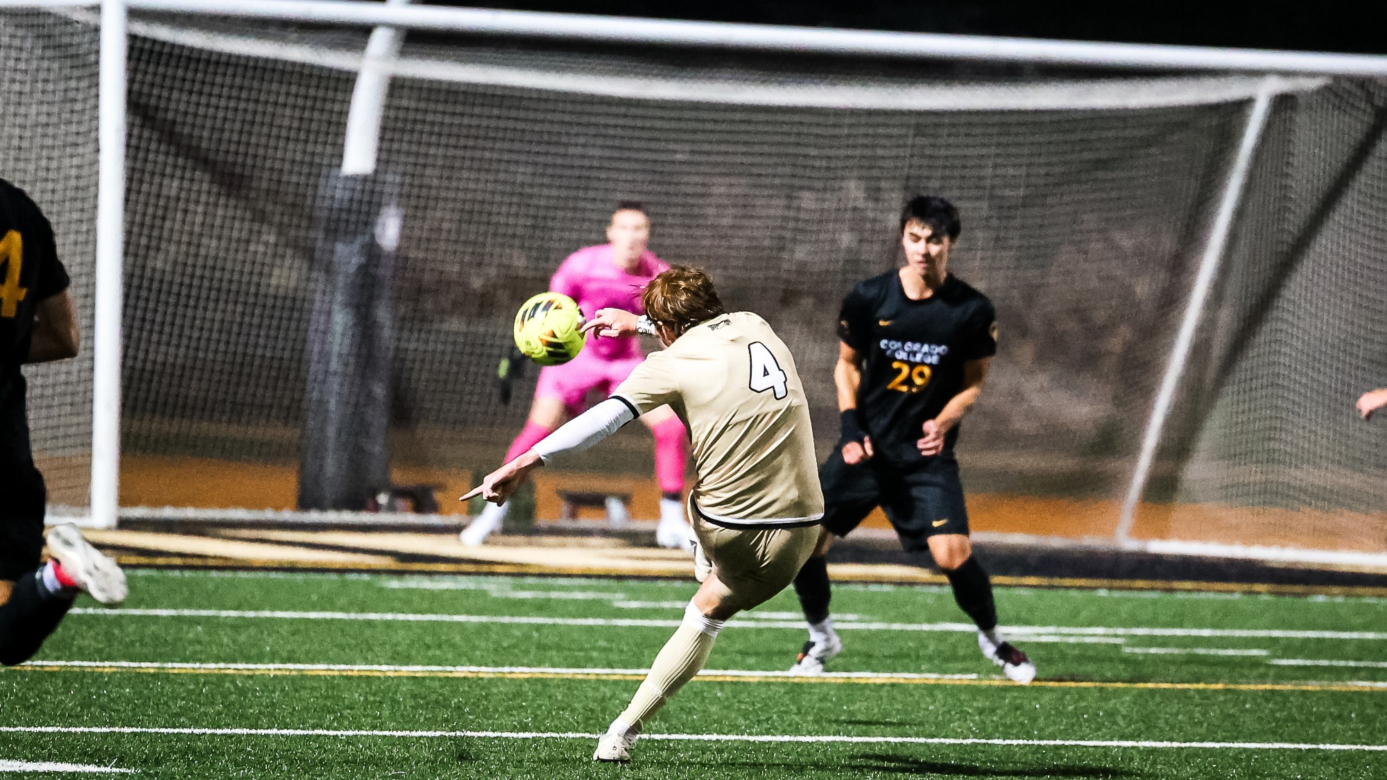 Henry Spethman fires a shot towards the goal against Colorado College